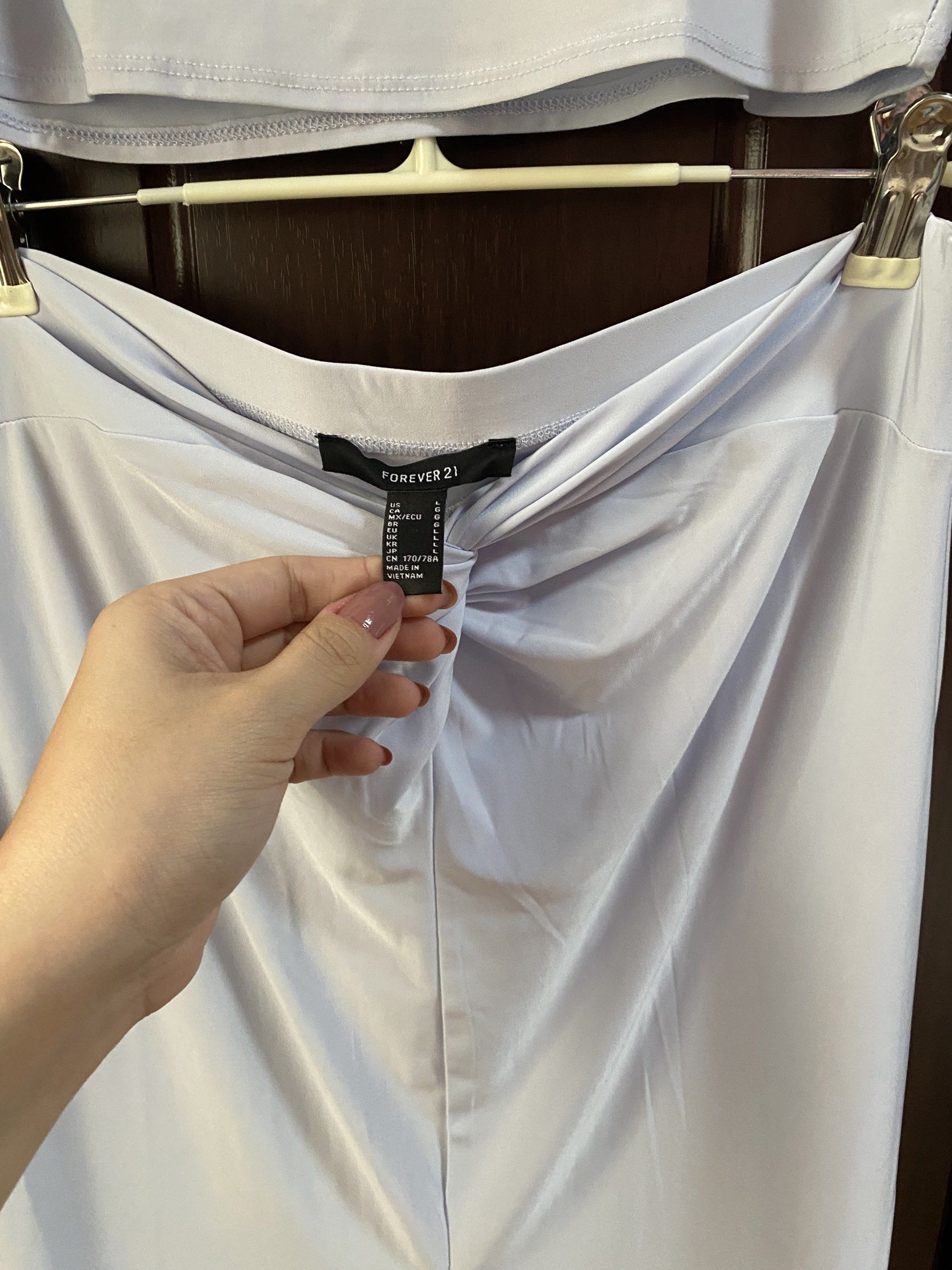 Forever 21 Crop Top and Skirt Set (Category: Sets or Coordinates) located in Taguig. Submitted by prelovedbyveronicag (Listing ID 1419520548, Image 3). Description: - Forever 21 lavender set (top and skirt) - Size: M - Top: Sleeveless, crew neck - Skirt: High-waisted, midi length with front slit and ruched detail.