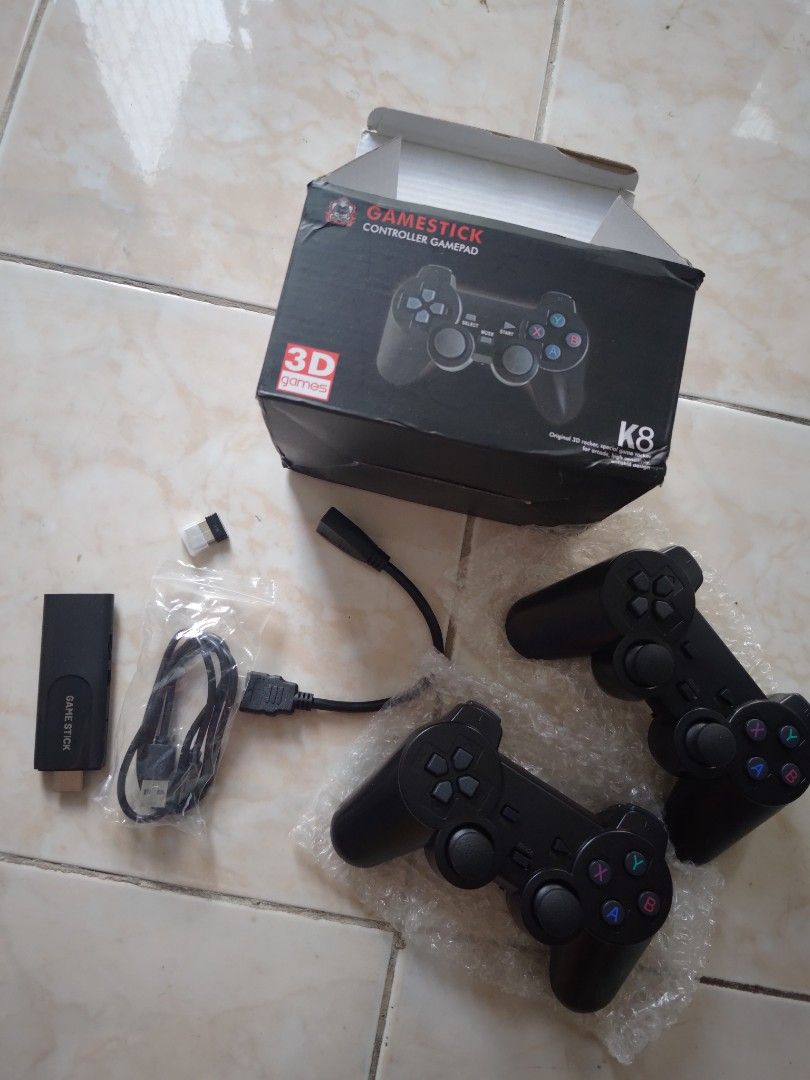 Gamestick with controllers 40,000 games (Category: Others) located in San Fernando. Submitted by masterambrose13 (Listing ID 1419586827, Image 1). Description: .