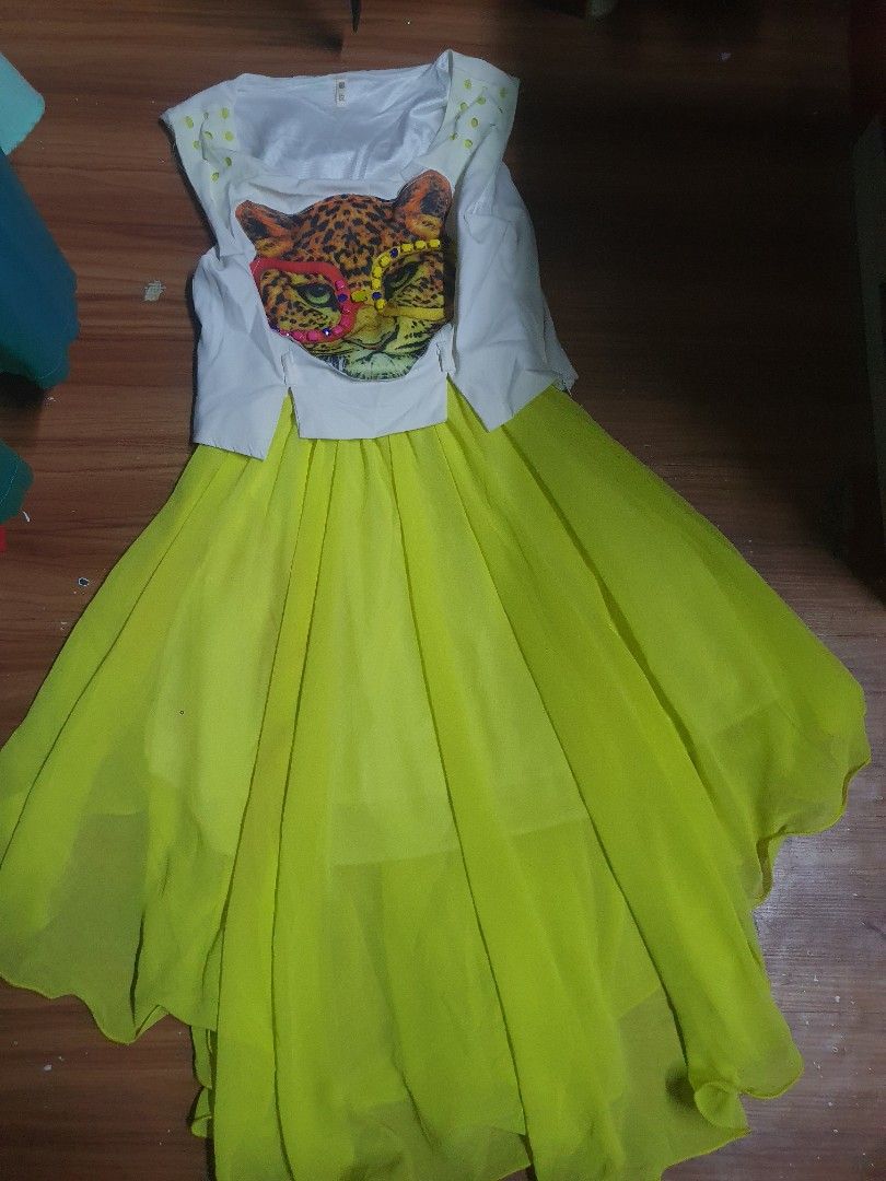 Girls' Leopard Print Dress (Category: Babies & Kids Fashion) located in Manila. Submitted by edzande (Listing ID 1419533636, Image 1). Description: - Adorable girls' dress - White top with leopard print design - Vibrant yellow skirt - Short sleeves - Round neckline - Made of flowing, lightweight fabric - Perfect for a fun and stylish look.