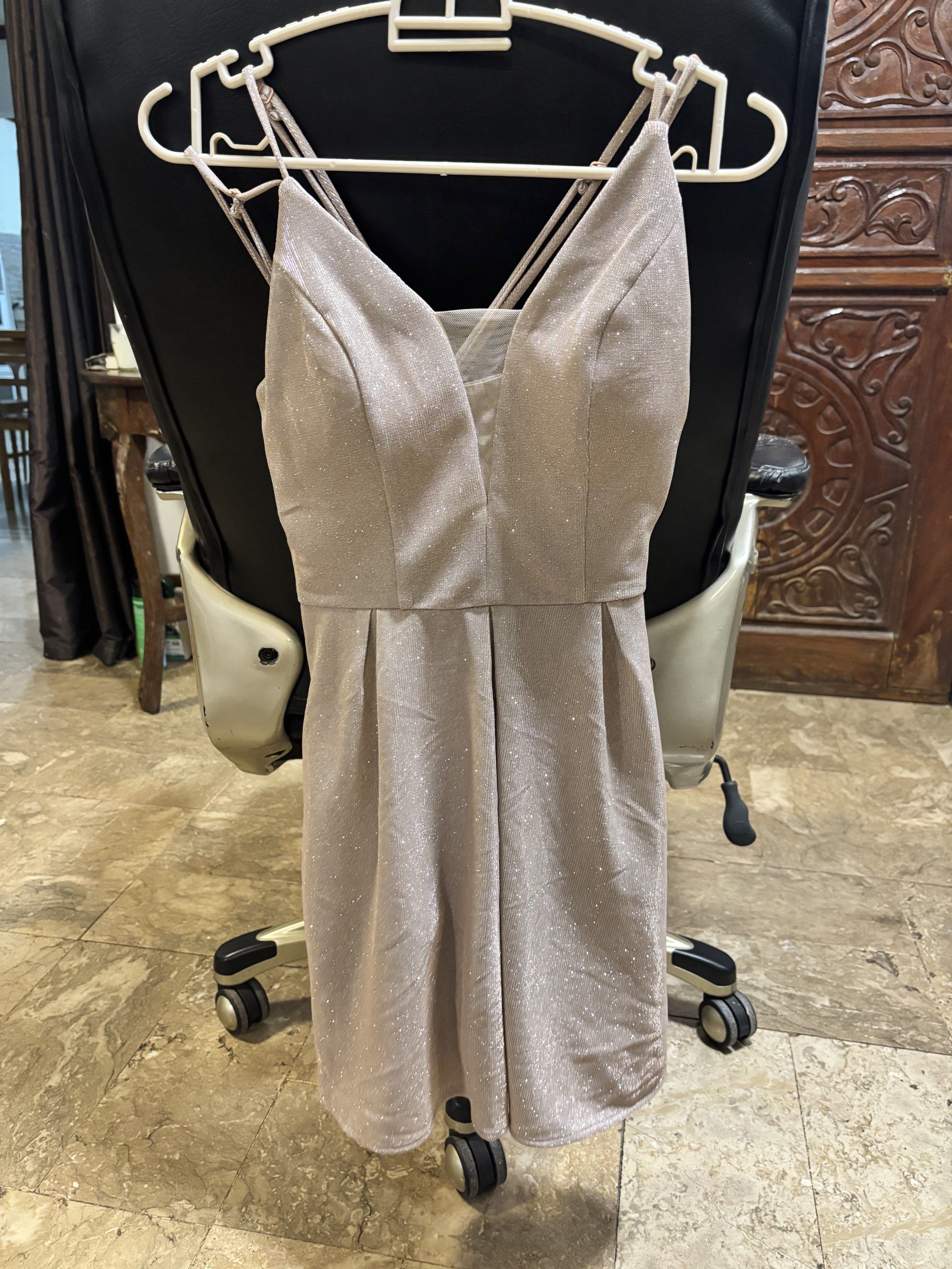 Glittery Party Dress (Category: Dresses) located in Muntinlupa City. Submitted by luckywind_377dea (Listing ID 1419514778, Image 2). Description: - V-neck party dress - Spaghetti straps - Fit-and-flare silhouette - Subtle glitter finish - Back zipper closure - Ideal for parties and special occasions.