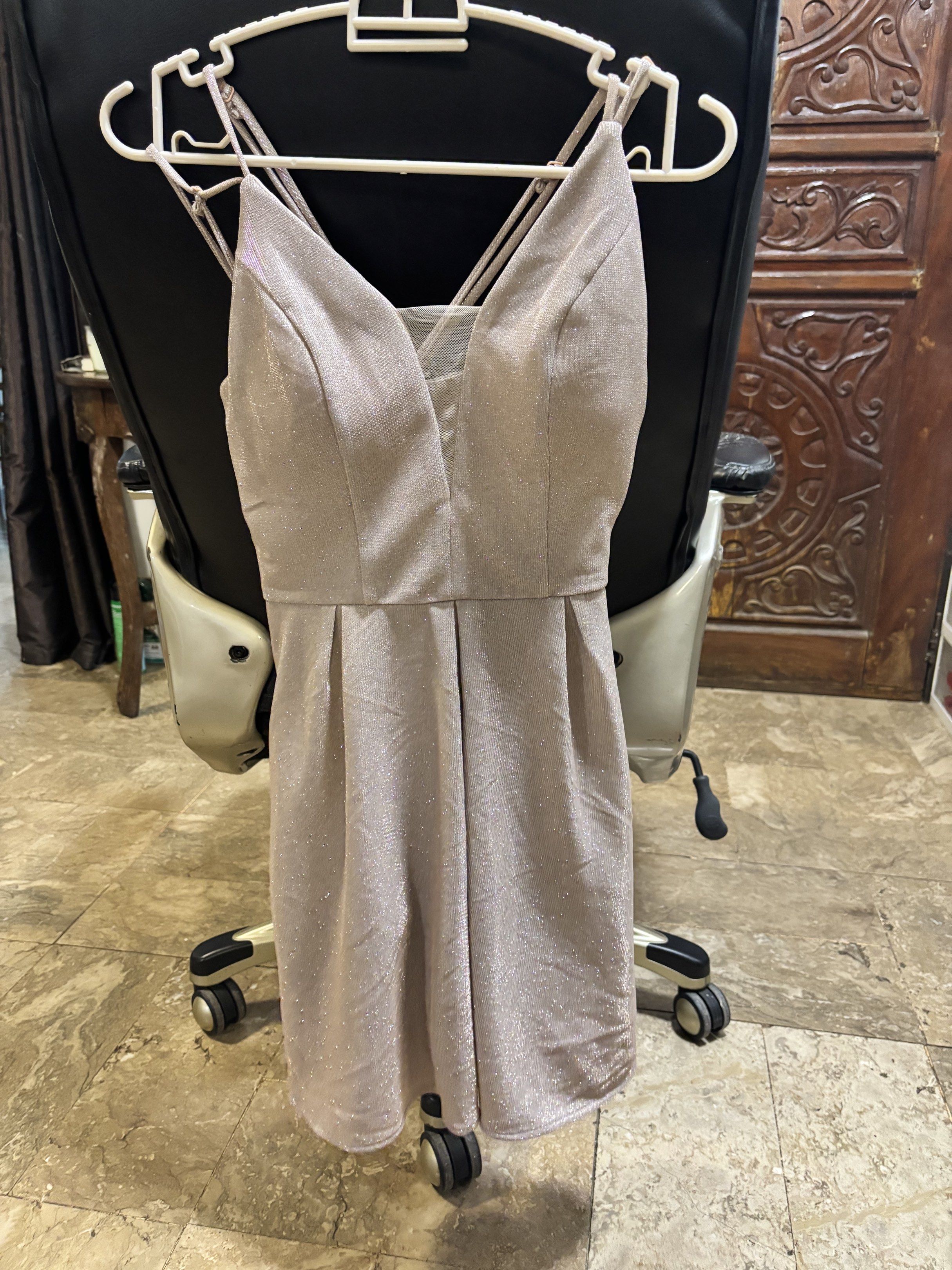 Glittery Party Dress (Category: Dresses) located in Muntinlupa City. Submitted by luckywind_377dea (Listing ID 1419514778, Image 1). Description: - V-neck party dress - Spaghetti straps - Fit-and-flare silhouette - Subtle glitter finish - Back zipper closure - Ideal for parties and special occasions.