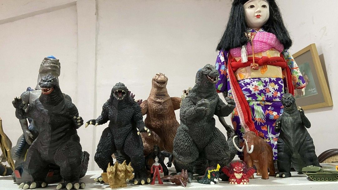 Godzilla Toy Figures Collection (Category: Figurines & Statues) located in Manila. Submitted by baloycollections2023 (Listing ID 1419554915, Image 1). Description: - Godzilla toy figure collection - Includes various Godzilla figures in different poses and colors - Features a Japanese doll and other small figures - Perfect for collectors and Godzilla fans - Ideal for display.