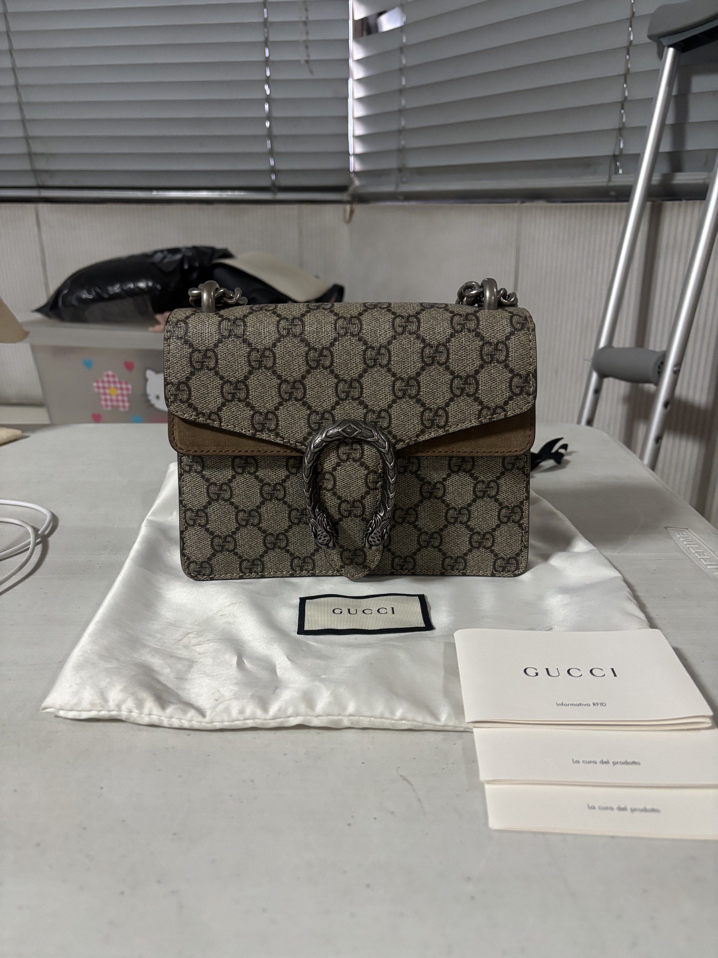 Gucci Mini Dionysus Shoulder Chain Bag (Category: Luxury Bags & Wallets) located in Quezon City. Submitted by sam.kim (Listing ID 1419541280, Image 1). Description: Gucci Mini Dionysus Shoulder Chain Bag - Authentic, Purchased year 2020 from DesignerDepotPH - Coloe: Taupe - With paper bag, dust bag, and cards - Used, excellent condition - Rfs: decluttering.