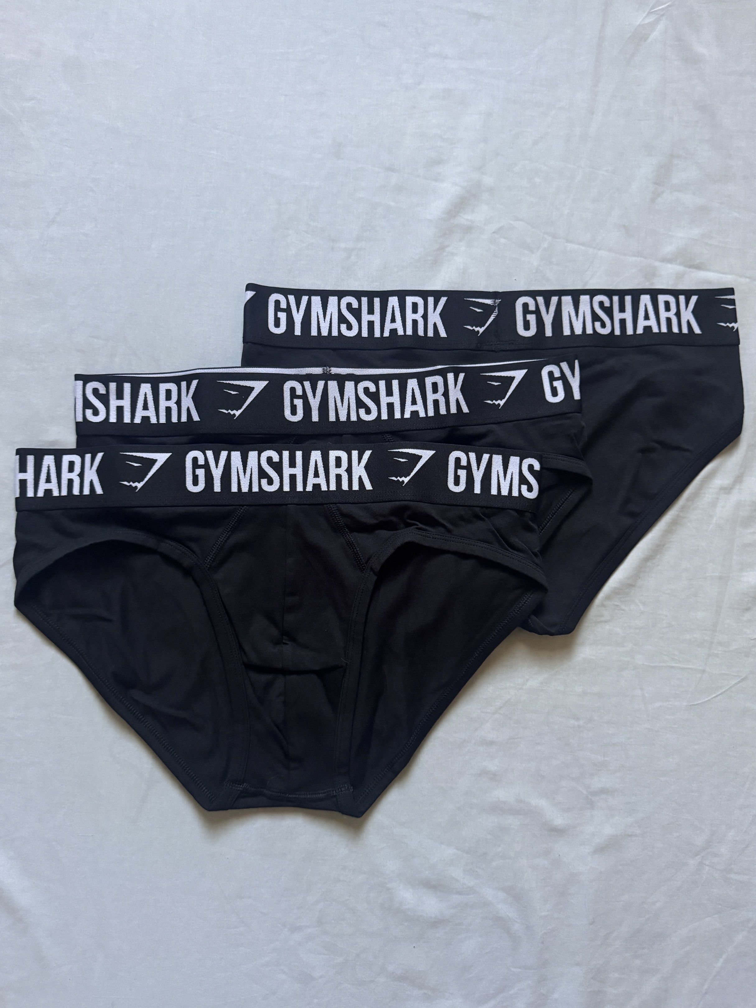 Gymshark Men's Briefs - Black 3Pk - Medium & Large (Category: Underwear) located in Manila. Submitted by chamber120_fit (Listing ID 1419444320, Image 1). Description: Available Size Medium & Large M : waist 85cm (33.5 in) / inside legs 82cm (32in) L : waist 90 cm (35.5 in) / inside legs 82cm (32in) . Soft, stretchy material that moves with you . Comfortable elasticated waistband . 3 per pack Size & Fit . Body fit . Classic brief shape Fixed Price