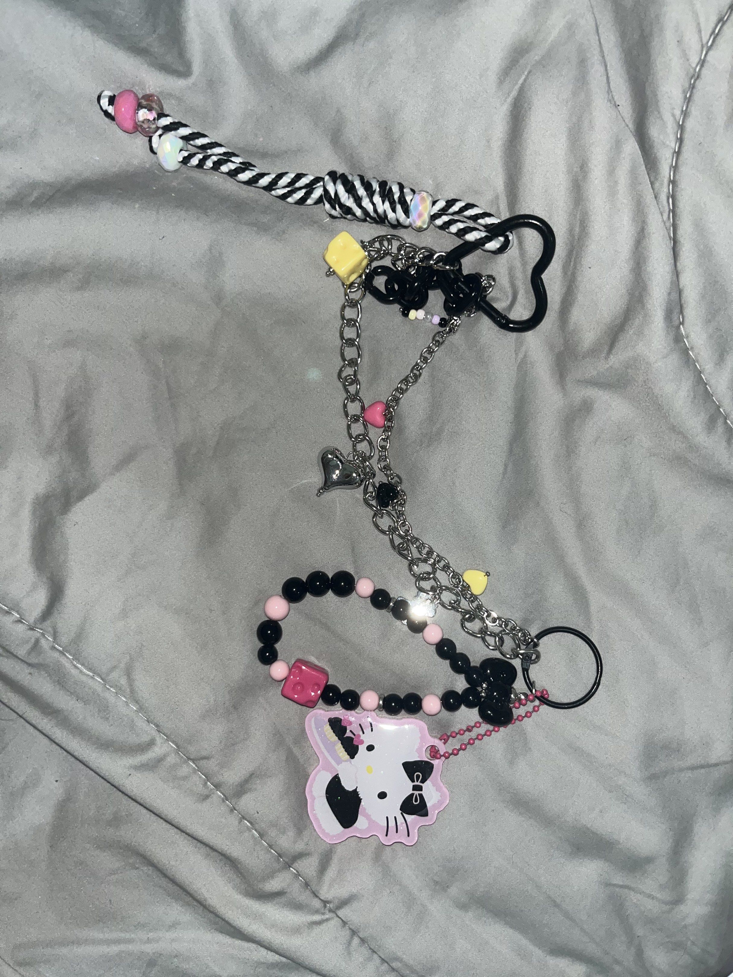 Hello Kitty Belt Chain (Category: Belts) located in Makati City. Submitted by hellogaragekitty (Listing ID 1419573155, Image 3). Description: HK BLACK & PINK CHAIN ANIK ANIK (can be used for bag or jeans) mine 379 lock 399 Reminders! ~ this item is handmade with mix of new and recycled products (specifically beads and trinkets) please set expectations accordingly 🧚🏼‍♀️ ~ color and material might differ on actual due to lighting and etc., rest a