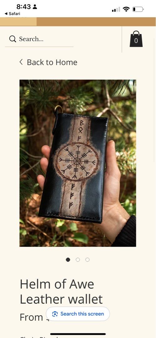 Helm of Awe Leather Wallet (Category: Luxury Bags & Wallets) located in Manila. Submitted by gee0505 (Listing ID 1419448106, Image 1). Description: - Black leather wallet - Tan stripe detail - Features the Helm of Awe symbol - Multiple card slots - Snap closure - Black leather interior - Unique design for Norse culture enthusiasts.