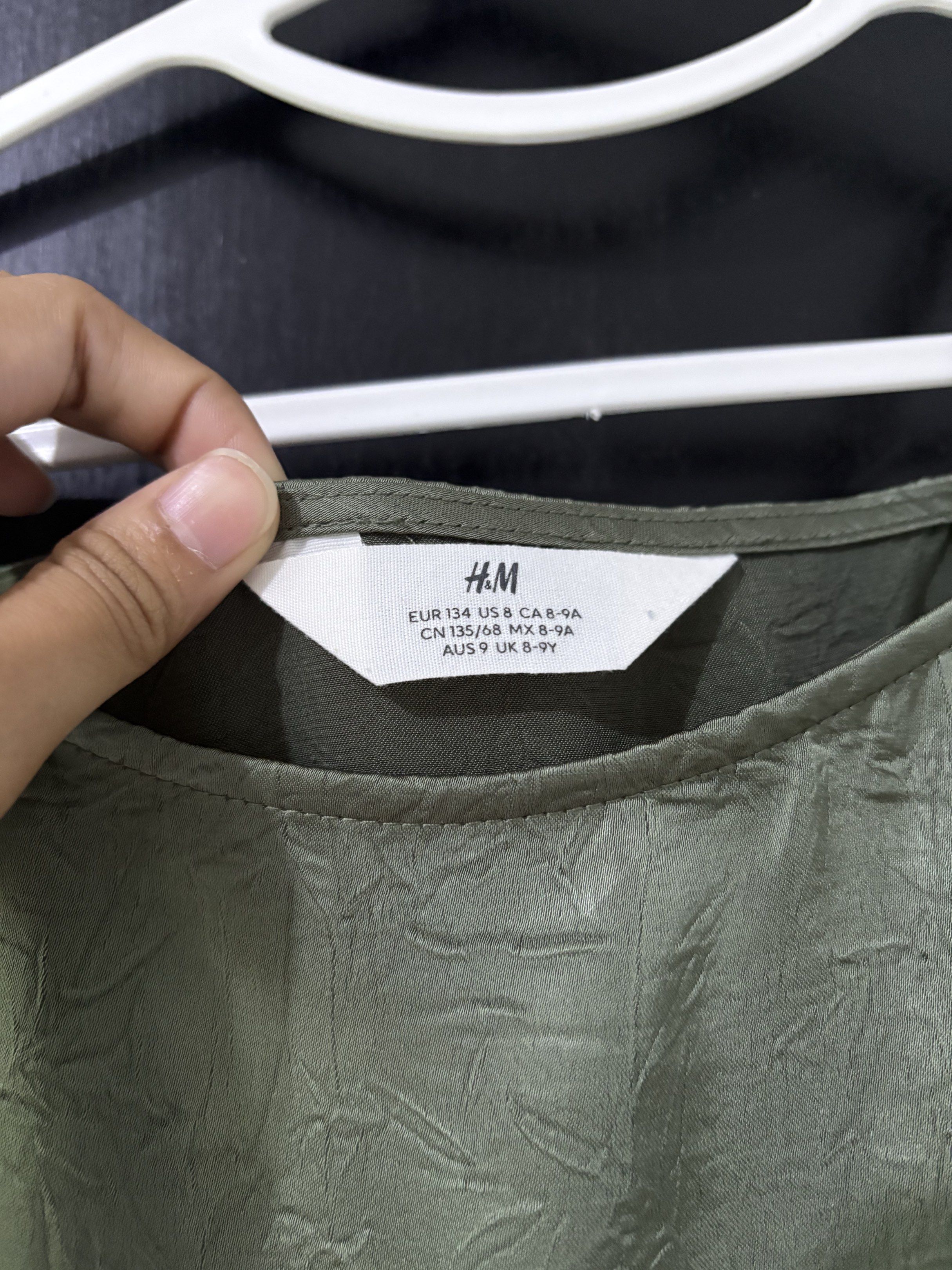 H&M Olive Green Dress (Category: Babies & Kids Fashion) located in Bulacan. Submitted by lenggayy (Listing ID 1419442361, Image 2). Description: - H&M Olive Green Slip Dress - Midi Length - Spaghetti Straps - Textured Fabric - 8-9Y on tag but can fit 3-6 yrs old only.