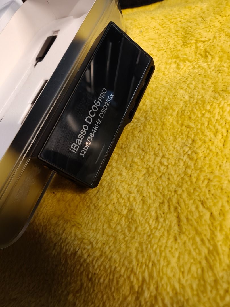 IBASSO DC06 PRO DONGLE DAC (Category: Soundbars, Speakers & Amplifiers) located in Imus. Submitted by gadgetphoenix (Listing ID 1419582580, Image 2). Description: IBASSO DC06 PRO SELLING PRICE: 8,499 PHP Condition & Quality: Condition: Excellent / Near Pristine (99% smooth). Physical State: No dents, cracks, or scratches; meticulously handled. History: Purchased June 13, 2024. Functionality: 100% working; zero issues. The Full Package: Unit: iBas