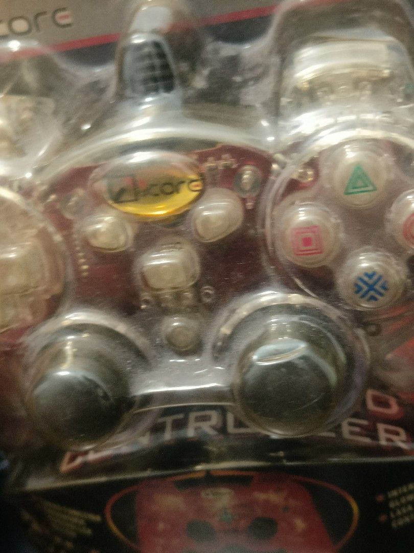 iCore Lava Liquid Controller for PS1/PS2 (Category: Controllers) located in Manila. Submitted by bigtym.picker (Listing ID 1419414888, Image 3). Description: FOR SALE!!! RARE VINTAGE BRAND NEW SEALED iCORE LAVA LIQUID CONTROLLER (PS1 OR PS2) Price - 1000 PESOS ONLY PLS SEE PIC FOR DETAILS. Selling all items AS IS PLS. manage your Expectation We accept shipping nationwide Meetup - BACOOR or near MOA #vintagefinds #luxury #vintageeyewear #sylberthr
