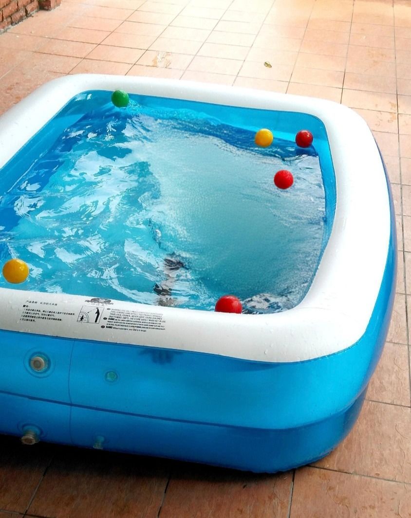 Inflatable Rectangular Swimming Pool (Category: Infant Playtime) located in Kajang. Submitted by dania2400 (Listing ID 1419415283, Image 1). Description: Inflatable Kids Pool for Sale 🌊 Perfect for kids to enjoy fun in the sun ☀️ Rectangular inflatable pool with a blue and white design Great for cooling off during hot weather Provides a safe and enjoyable water play experience PM if interested 😊.