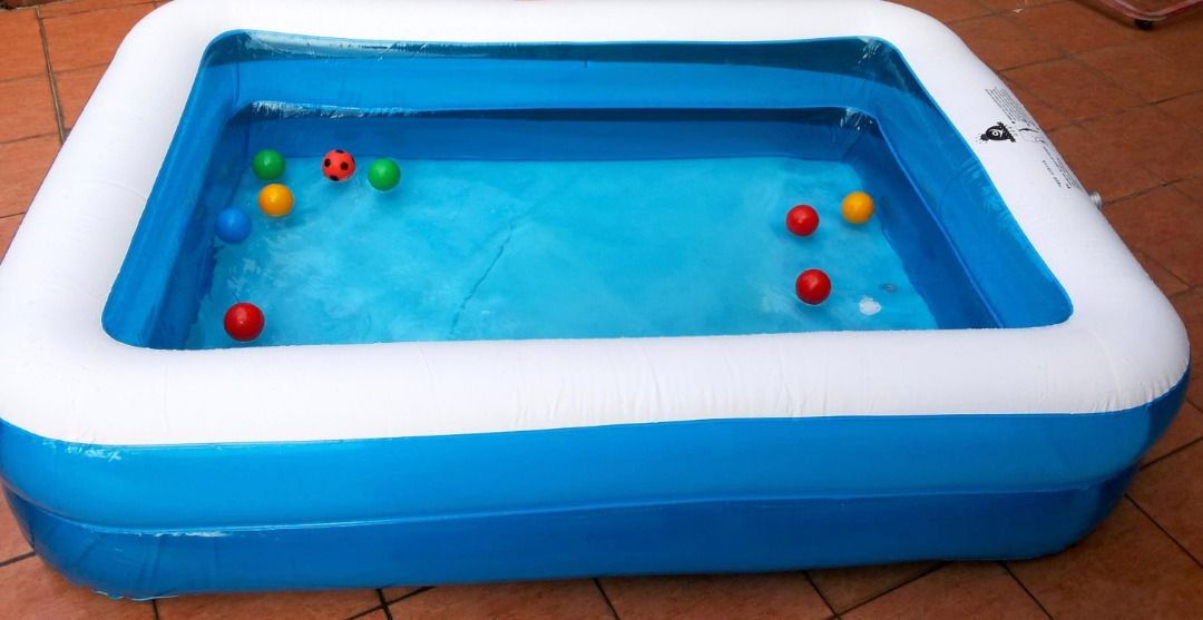 Inflatable Rectangular Swimming Pool (Category: Infant Playtime) located in Kajang. Submitted by dania2400 (Listing ID 1419415283, Image 2). Description: Inflatable Kids Pool for Sale 🌊 Perfect for kids to enjoy fun in the sun ☀️ Rectangular inflatable pool with a blue and white design Great for cooling off during hot weather Provides a safe and enjoyable water play experience PM if interested 😊.
