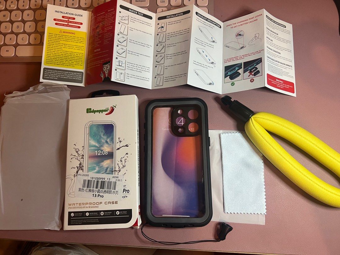 iPhone 13 Pro Waterproof shockproof Case (Category: Cases & Sleeves) located in Quezon City. Submitted by nikkatan14 (Listing ID 1419484365, Image 2). Description: Only used once. Comes with free floating strap. Works well, water really doesn’t go inside and the buttons all work well. Convenient also since you can open the charging port cover so you can charge without removing the case. Note that since this is all enclosed case, you cannot have t