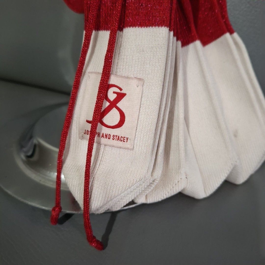 Joseph and Stacey Pleated Knit Bag (Category: Shoulder Bags) located in Don Carlos. Submitted by PphiXi_Finds (Listing ID 1419397746, Image 1). Description: - Joseph & Stacey Pleats Knit Bag - Red (glitter) and White color scheme - Unique pleated design - Drawstring closure - Made of knit material - needs wash or cleaning .