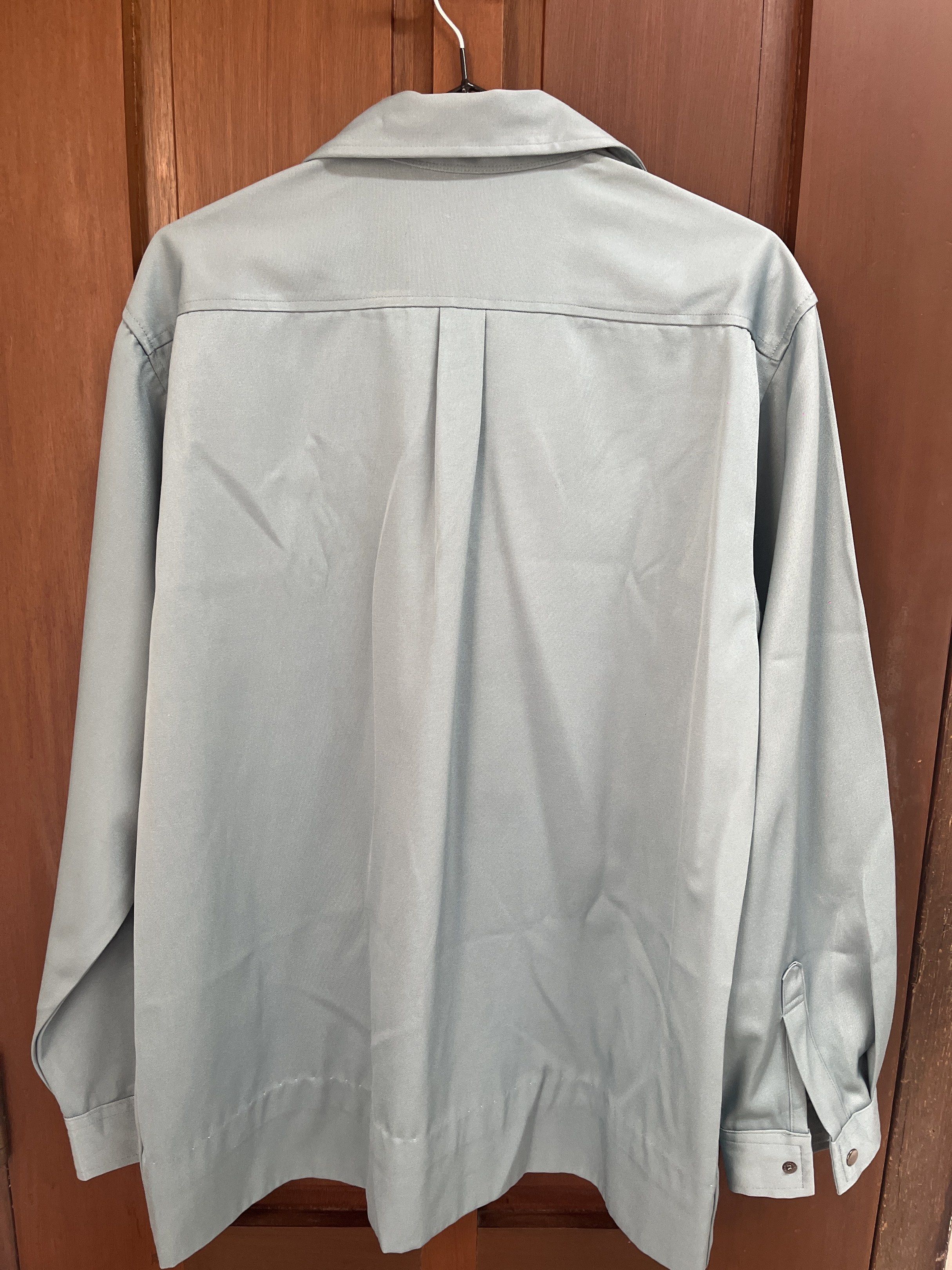 JRP Racing Product Thailand Jacket (Category: Coats, Jackets and Outerwear) located in Muntinlupa City. Submitted by timttam (Listing ID 1419481938, Image 3). Description: - Bluish green jacket - JRP Racing Product Thailand logo - Two chest pockets with button closures - Buttoned cuffs - Pleated back design - Collared neckline - Button-down front.