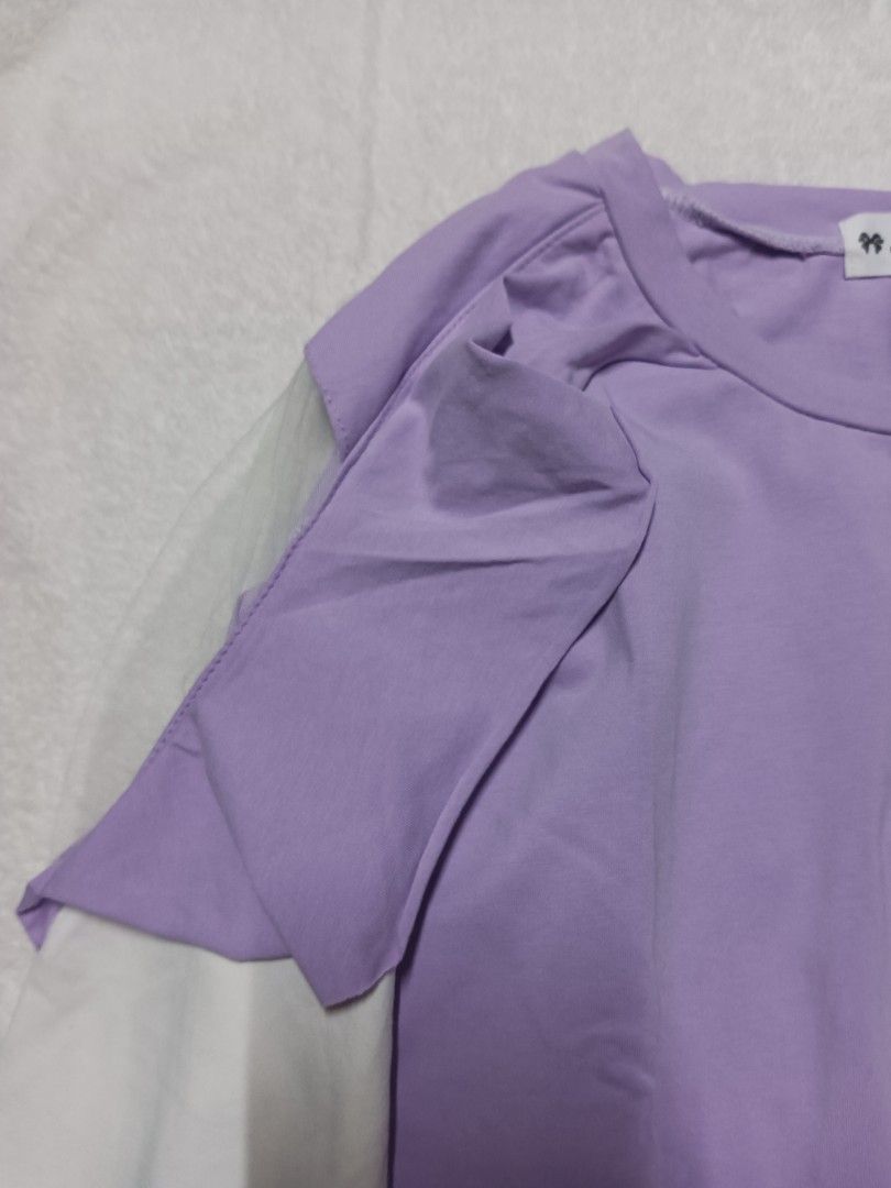 Jun Purple Layered Top (Category: Blouses) located in Malabon City. Submitted by mslalan (Listing ID 1419401332, Image 3). Description: - Layered design - Purple body, white sleeves - Round neckline - Cuffed sleeves - Soft, comfortable fabric - Brand tag visible - Ideal for casual wear.