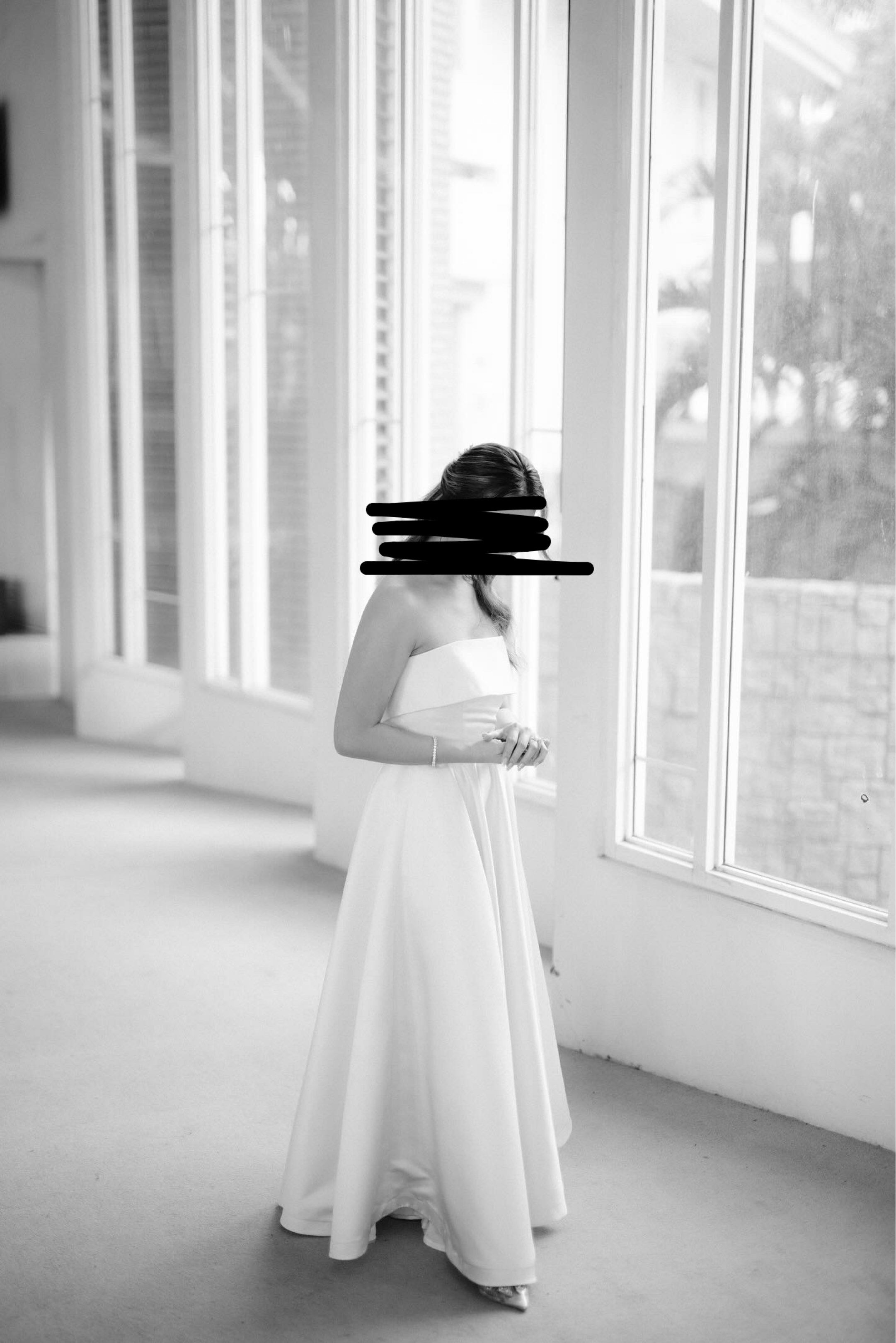 June 12 The Label White Dress (Category: Evening dresses & gowns) located in Quezon City. Submitted by maveeyy (Listing ID 1419504697, Image 3). Description: - Strapless / tube white gown - Fitted bodice - Flowing A-line skirt - Simple, classic design - Duchess satin fabric - Pearl white Cruz dress, custom made by June 12 the Label. Used only once for our small church wedding. Height: 5”3,Bust: 34, Waist: 28 Original price: 8-10k depending on the