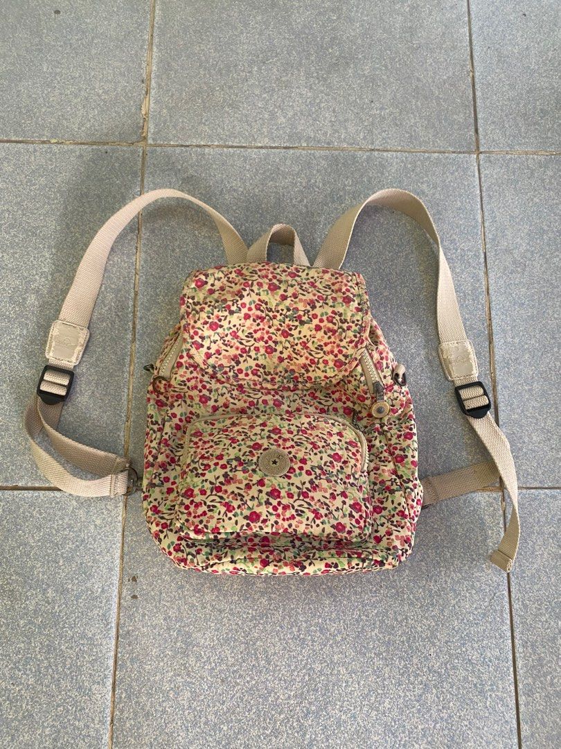 Kipling Floral Mini Backpack (Category: Backpacks) located in Davao. Submitted by fritzay (Listing ID 1419521756, Image 2). Description: - Kipling mini backpack with a floral print - Front pocket for easy access - Adjustable straps for a comfortable fit - Top handle for carrying - Interior zippered pocket and key clip - Signature Kipling logo - Heart-patterned interior lining Issue nasa picture + sf💸💸 Loc. Davao city, Mindanao 📍.