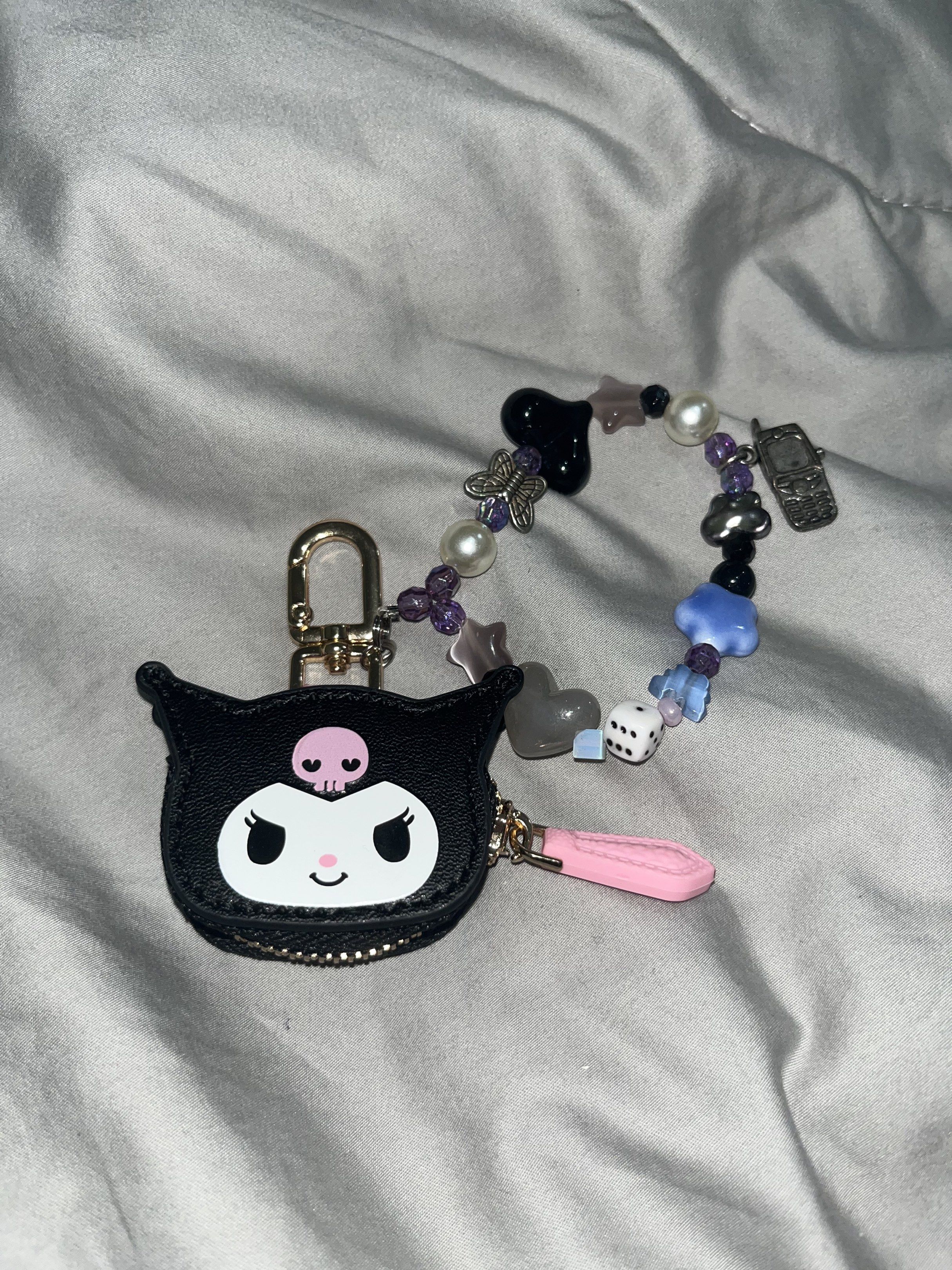 Kuromi coin pouch with Bead Charm (Category: Purses & Pouches) located in Makati City. Submitted by hellogaragekitty (Listing ID 1419573455, Image 2). Description: KUROMI COIN PURSE KEYCHAIN CHARM mine 349 lock 369 Reminders! ~ this item is handmade with mix of new and recycled products (specifically beads and trinkets) please set expectations accordingly 🧚🏼‍♀️ ~ color and material might differ on actual due to lighting and etc., rest assured w