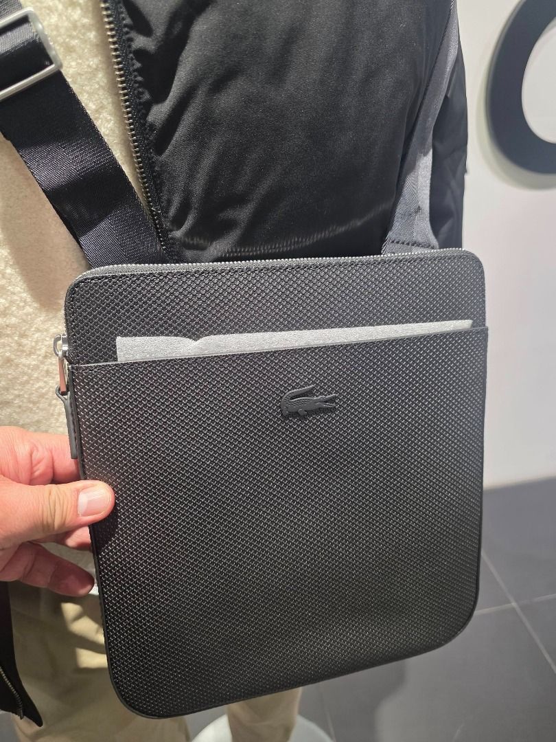 Lacoste Flat Crossover Sling Bag Brandnew (Category: Luxury Bags & Wallets) located in Santa Rosa. Submitted by omnicronzxc (Listing ID 1419546909, Image 3). Description: Brandnew Original Packaging with lacoste paperbag ✅₱6,500 each FREE shipping JNT PO Sling Bag Condition: BRAND NEW rate : 10/10.