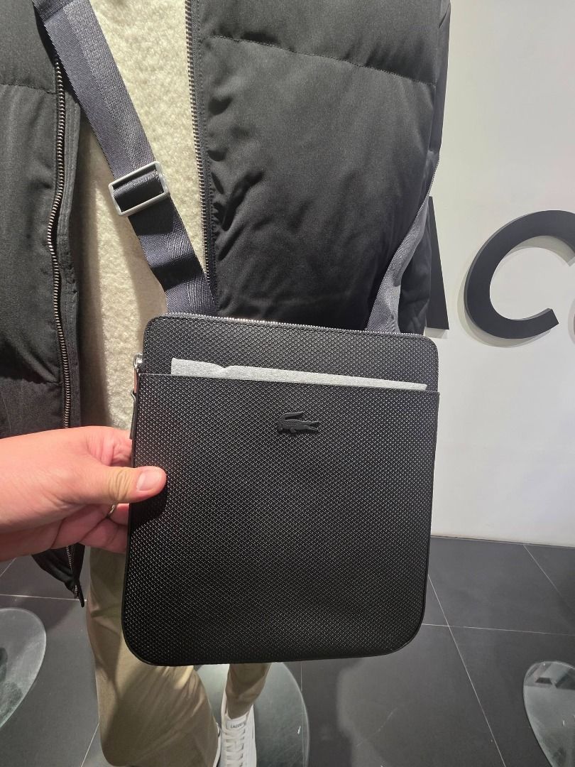 Lacoste Flat Crossover Sling Bag Brandnew (Category: Luxury Bags & Wallets) located in Santa Rosa. Submitted by omnicronzxc (Listing ID 1419546909, Image 2). Description: Brandnew Original Packaging with lacoste paperbag ✅₱6,500 each FREE shipping JNT PO Sling Bag Condition: BRAND NEW rate : 10/10.