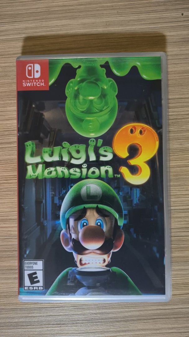 Luigi's Mansion 3 - Nintendo Switch (1, Lite, Oled) (Category: Nintendo) located in Pateros City. Submitted by von282 (Listing ID 1419393982, Image 1). Description: - Luigi's Mansion 3 for Nintendo Switch - Includes game cartridge and case - Explore a haunted hotel - Features the Poltergust G-00 and Gooigi - Rated E for Everyone ❗Cartridge with issue : has bite marks front and back ❗im 2nd owner and game is still playable without problem 👍🏼 can
