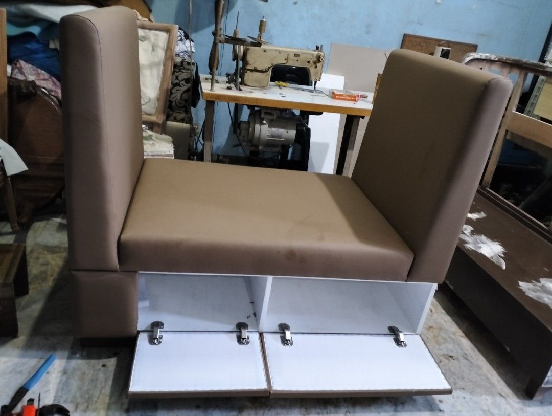 Manny's Decor and General Upholstery (Category: Chairs) located in Manila. Submitted by olxph_102891822 (Listing ID 1419584019, Image 3). Description: - Custom-made cafe booth seating - Brown leather-like material - Built-in storage compartment with hinged doors - Comfortable backrest and side panels - Designed for cafes and restaurants - Seats multiple people - Stylish design - We accept customize sofa set, Curtains, Roll up blinds, Re upholster
