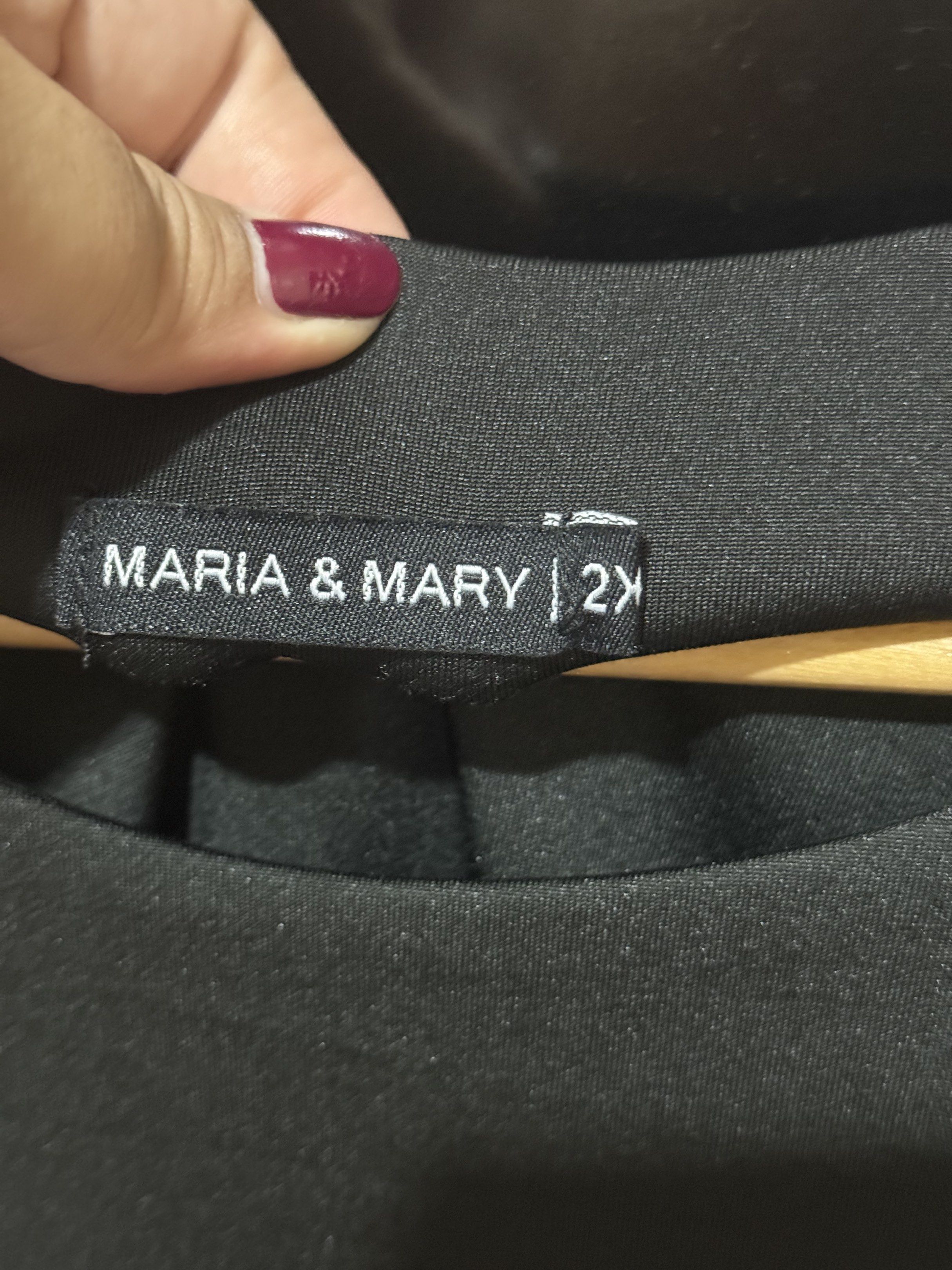 Maria & Mary Black Bodysuit 2X (Category: Others Tops) located in Pasig City. Submitted by kingdomgeneral (Listing ID 1419400023, Image 3). Description: - Maria & Mary bodysuit - Color: Black - Size: 2X - Features: - Short sleeves - Scoop back - Snap closures at the bottom.