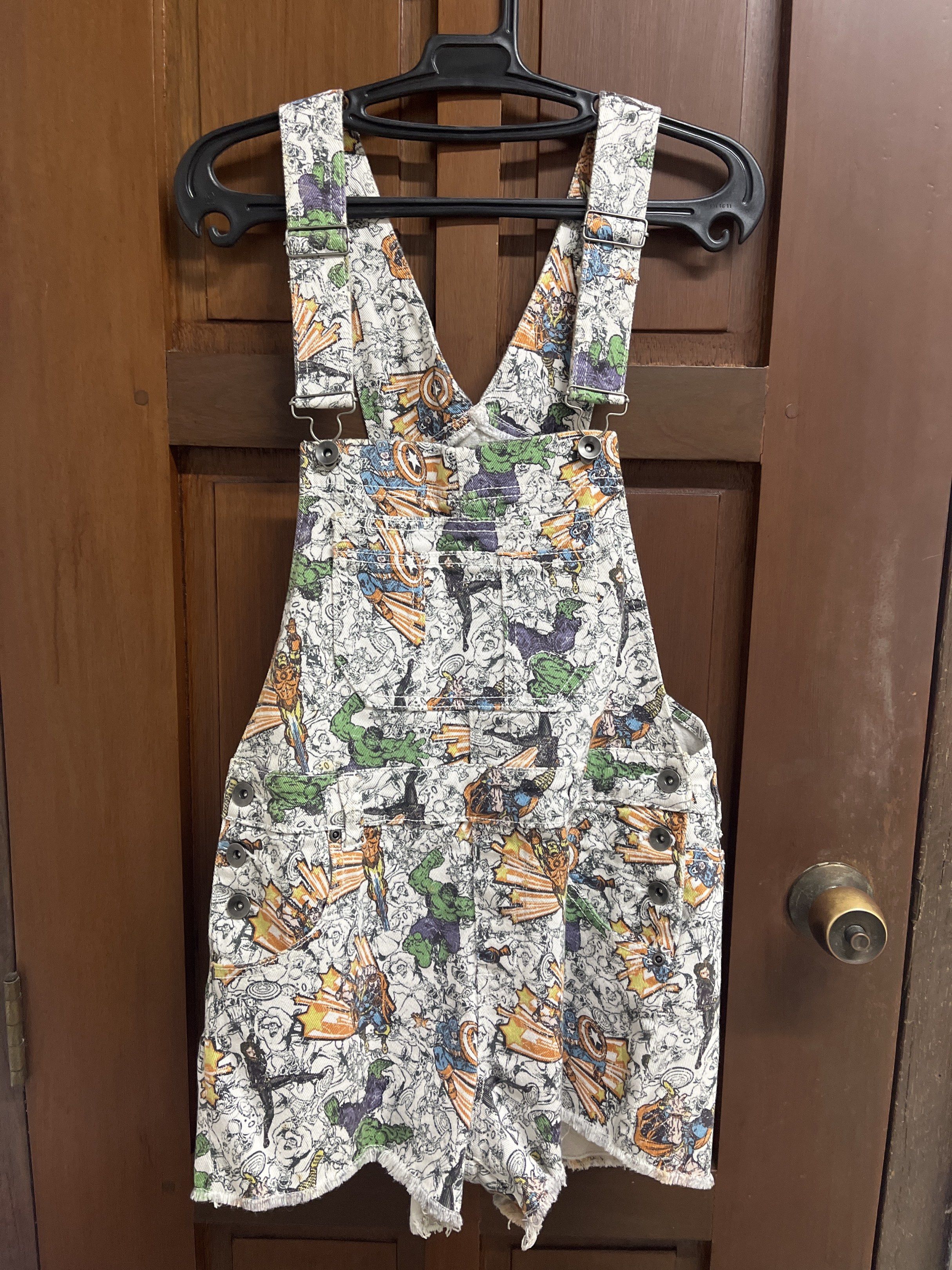 Marvel by Her Universe Overalls (Category: Jumpsuits) located in Muntinlupa City. Submitted by timttam (Listing ID 1419499877, Image 1). Description: Marvel shorts overalls - Unique design - For Marvel fans! Barely used Bought abroad Price negotiable..