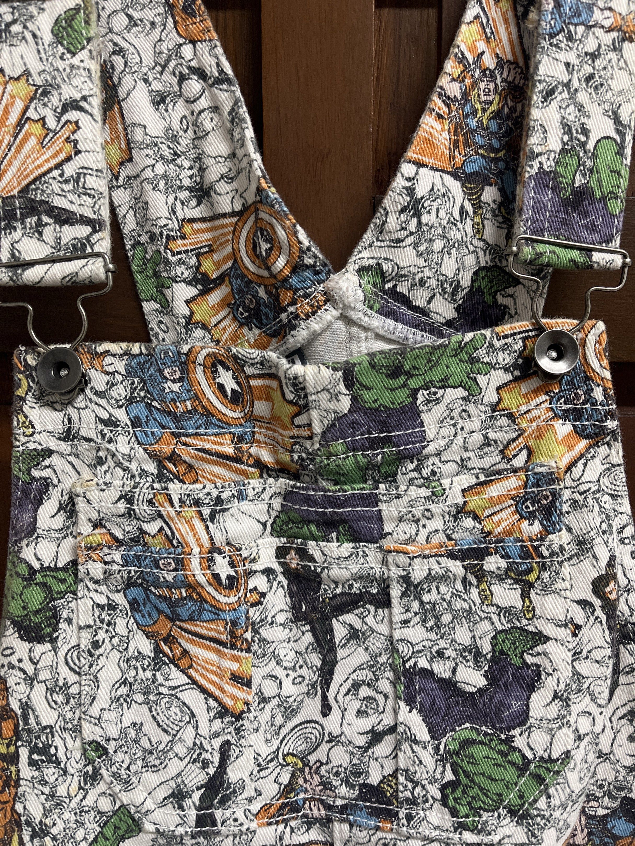 Marvel by Her Universe Overalls (Category: Jumpsuits) located in Muntinlupa City. Submitted by timttam (Listing ID 1419499877, Image 3). Description: Marvel shorts overalls - Unique design - For Marvel fans! Barely used Bought abroad Price negotiable..