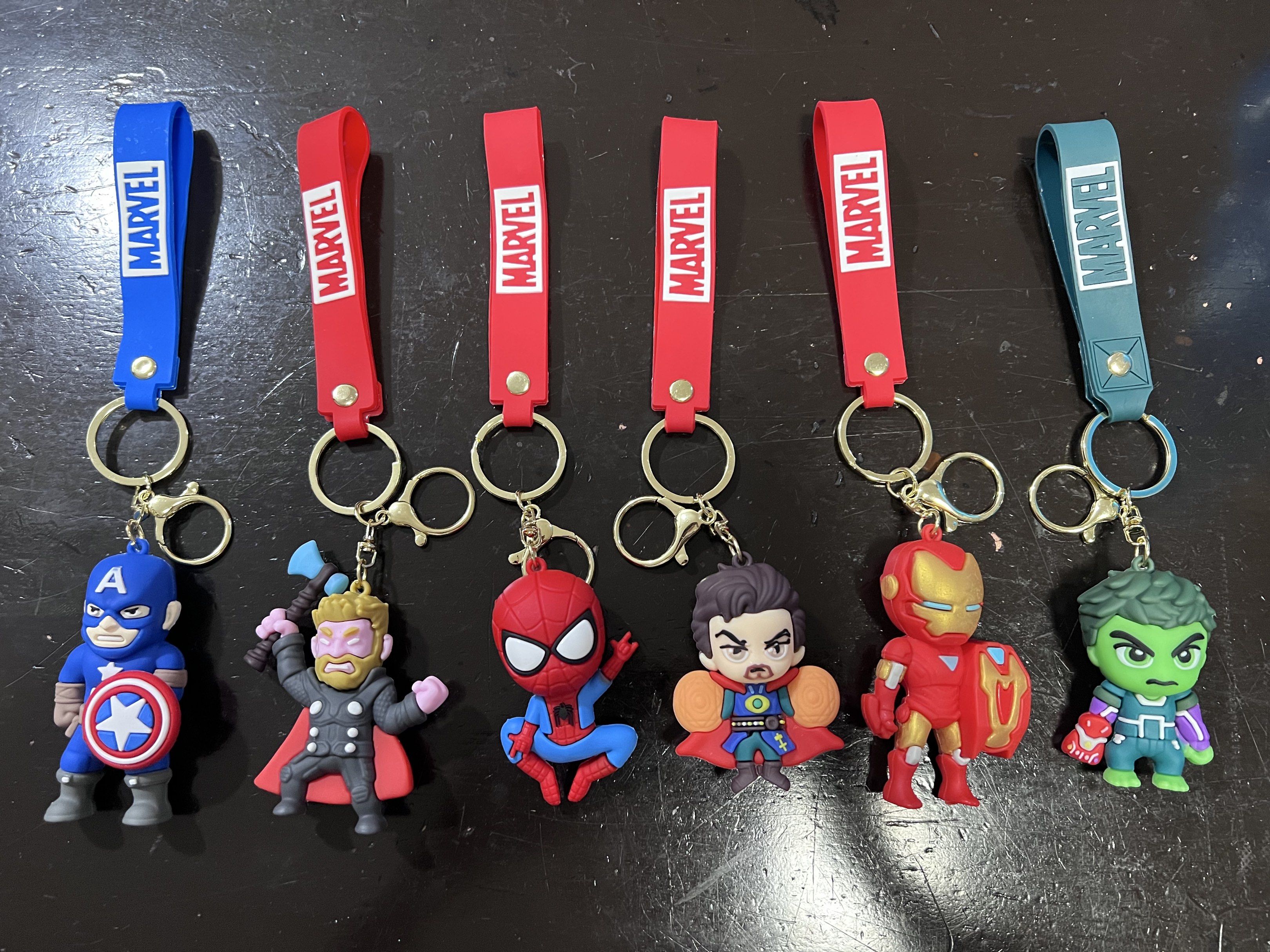 Marvel, Pokemon, Starbucks, Squid Game Keychains from China (Category: Character Goods) located in Manila. Submitted by julia.irene (Listing ID 1419434699, Image 2). Description: Various character keychains available. Includes Marvel characters like Captain America, Thor, Spider-Man, Doctor Strange, Iron Man, and Hulk. Also features Pokemon characters Pikachu and Gengar, Squid Game characters, and Starbucks-themed keychains. Some keychains have w