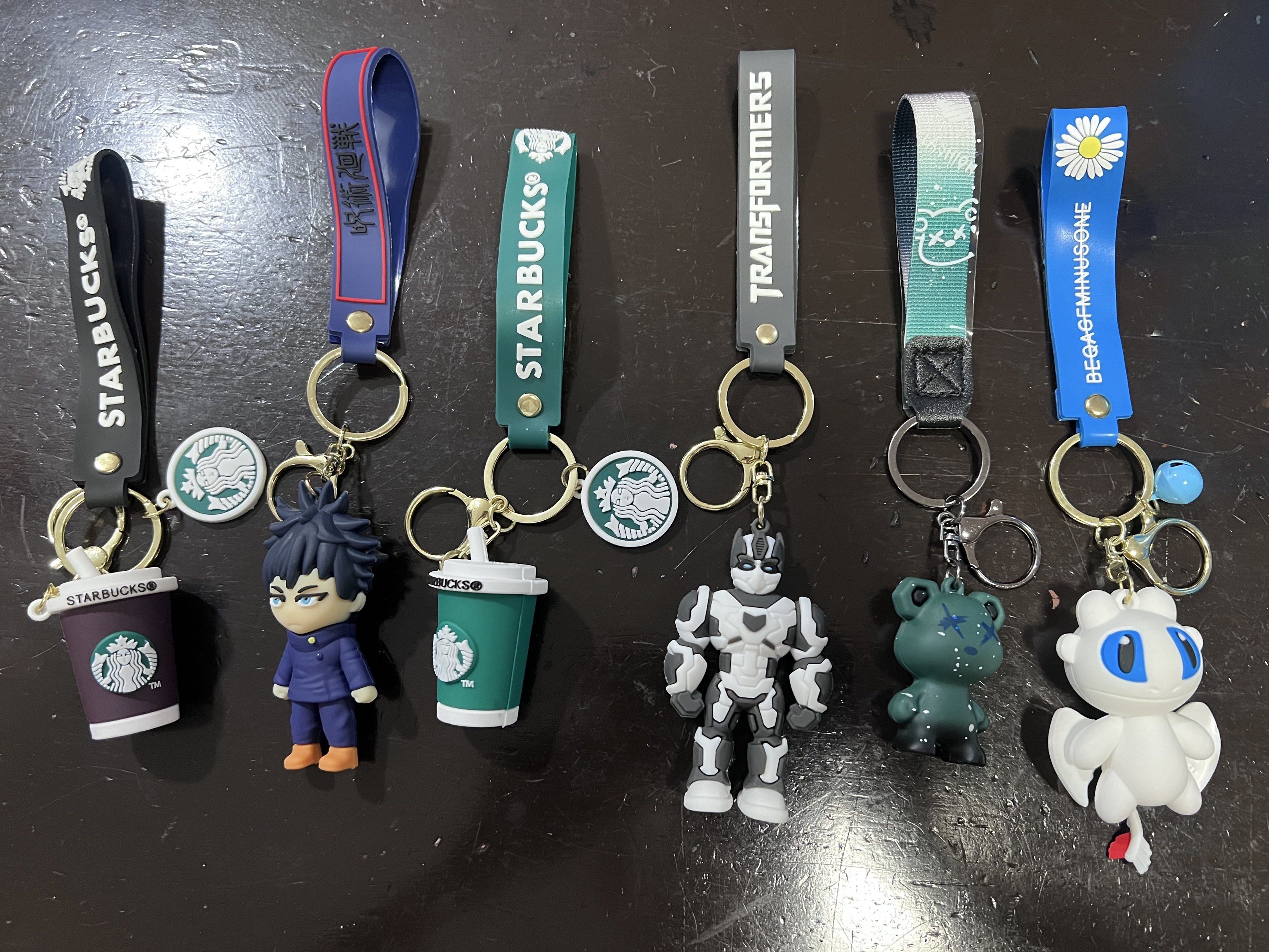 Marvel, Pokemon, Starbucks, Squid Game Keychains from China (Category: Character Goods) located in Manila. Submitted by julia.irene (Listing ID 1419434699, Image 3). Description: Various character keychains available. Includes Marvel characters like Captain America, Thor, Spider-Man, Doctor Strange, Iron Man, and Hulk. Also features Pokemon characters Pikachu and Gengar, Squid Game characters, and Starbucks-themed keychains. Some keychains have w