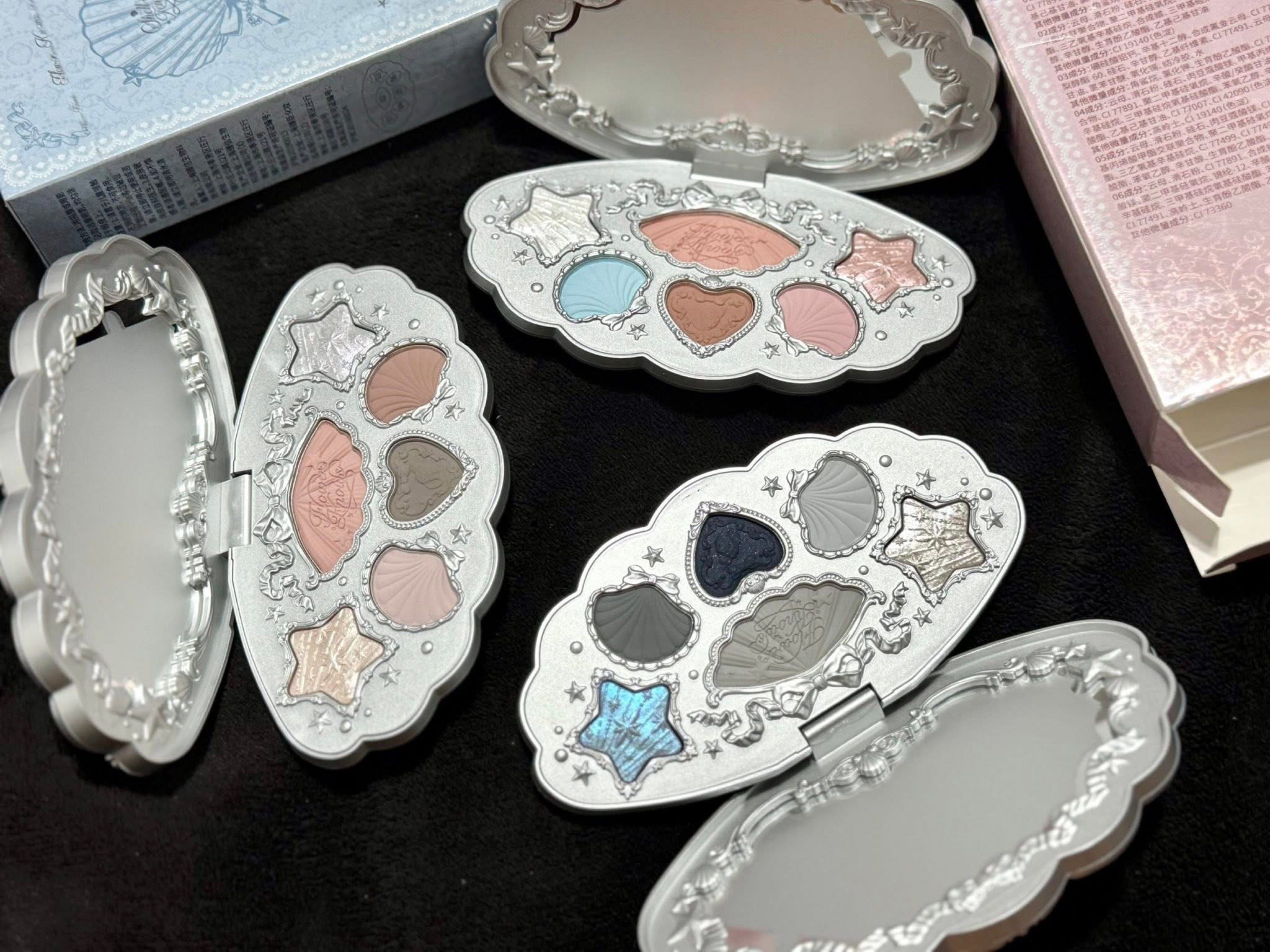 Mermaid Shell Eyeshadow Palette (Category: Makeup) located in Manila. Submitted by n4thlie (Listing ID 1419526291, Image 2). Description: - Shell-shaped eyeshadow palette - Unique star and shell-shaped eyeshadows - Includes a mirror - Available in multiple colors - Shell-themed packaging.