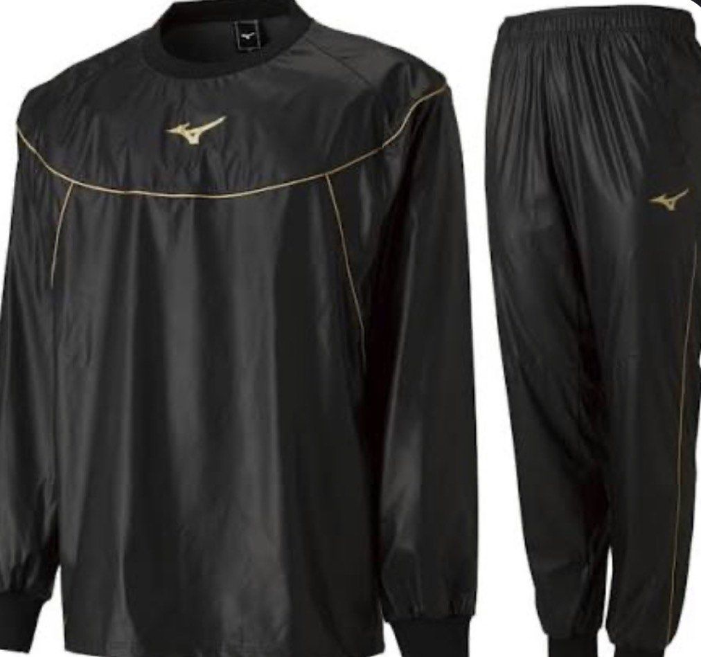Mizuno sauna suit Black Tracksuit (Category: Activewear) located in Manila. Submitted by gariet (Listing ID 1419418428, Image 3). Description: - Black Mizuno tracksuit - Includes long-sleeved top and pants - Top features round neck and gold accents - Pants have matching gold accent and Mizuno logo - Made of lightweight, possibly water-resistant material - Pants include pockets GOOD FOR LOSING WEIGHT AND WARMER FOR SPORTS.