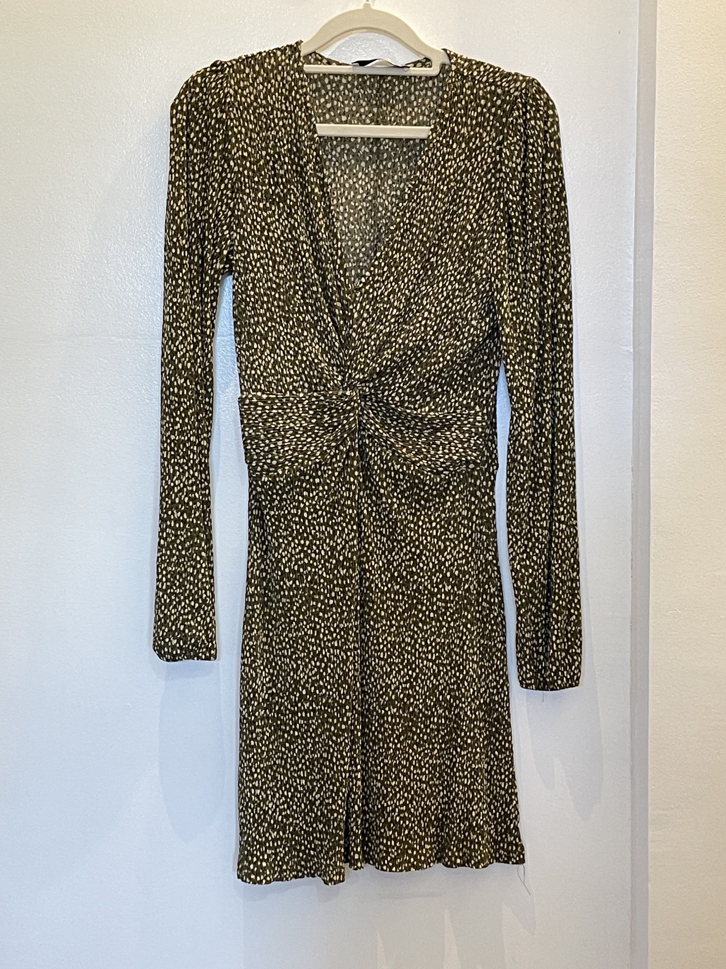 MNG Long Sleeve Mini Dress (Category: Dresses) located in Tacloban City. Submitted by declutterwithbel (Listing ID 1419409517, Image 1). Description: MNG mini dress features a V-neckline and long sleeves. It has a ruched detail at the waist and a subtle all-over print. The dress is a size S (EUR) and 4 (MEX)..
