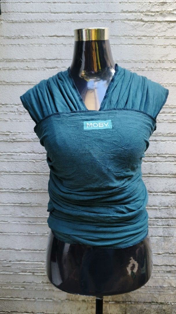 Moby, Boba, and other Baby Wraps (Category: Carriers & Slings) located in Baguio. Submitted by ukay_district (Listing ID 1419404525, Image 2). Description: - Baby wraps for comfortable babywearing. - Brands: Moby, Boba, and more. - Colors: Navy, teal, gray, and neutral tones. - Designed for easy and versatile babywearing. - Perfect for keeping your baby close while you're on the go. PRICES VARIES, PLEASE SEND A MESSAGE FOR MORE PHOTOS.