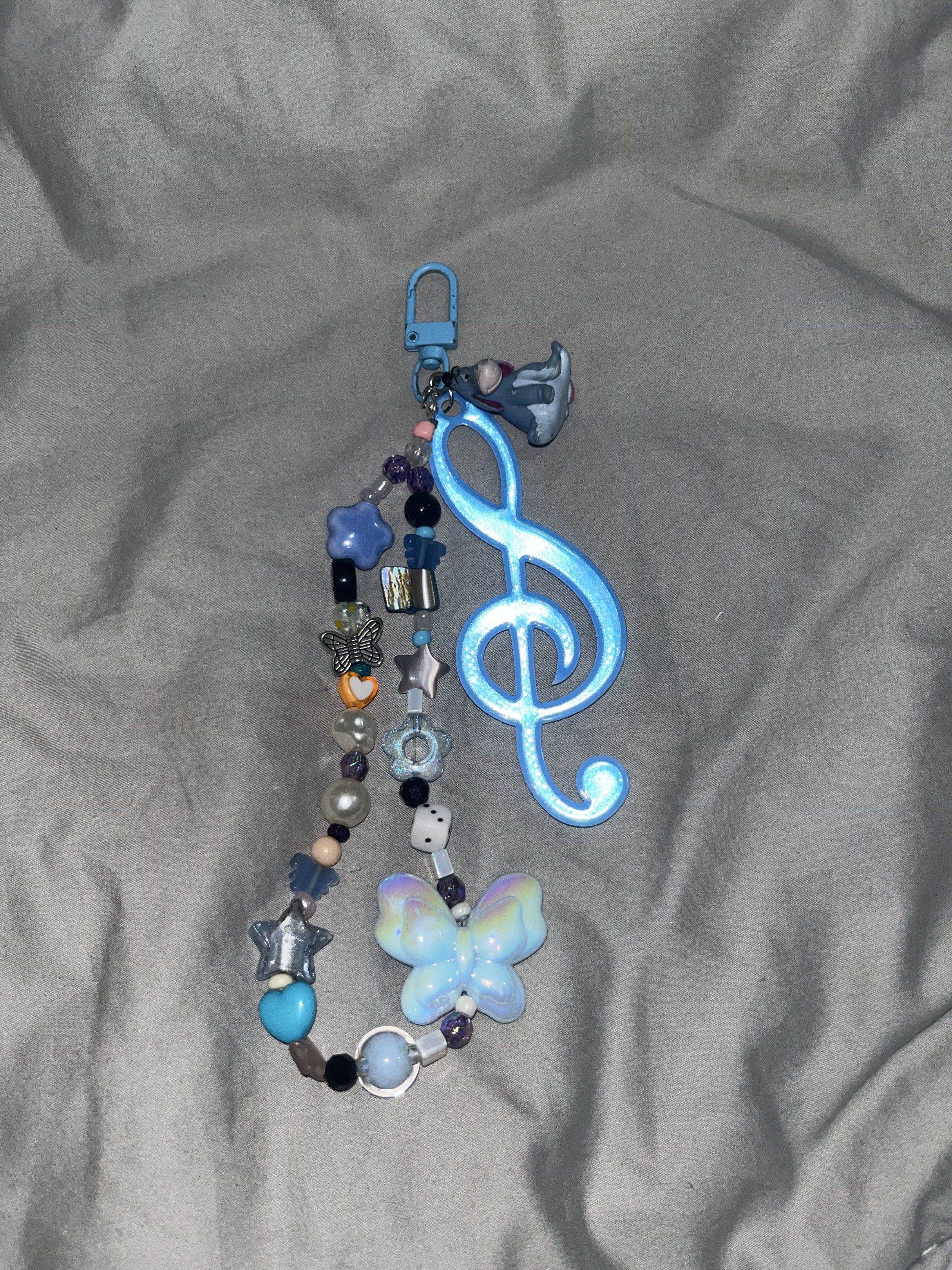 Music Note EEYORE Charm Keychain (Category: Character Goods) located in Makati City. Submitted by hellogaragekitty (Listing ID 1419573275, Image 2). Description: EEYORE MUSICAL DISNEY KEYCHAIN mine 219 lock 229 Reminders! ~ this item is handmade with mix of new and recycled products (specifically beads and trinkets) please set expectations accordingly 🧚🏼‍♀️ ~ color and material might differ on actual due to lighting and etc., rest assured what 