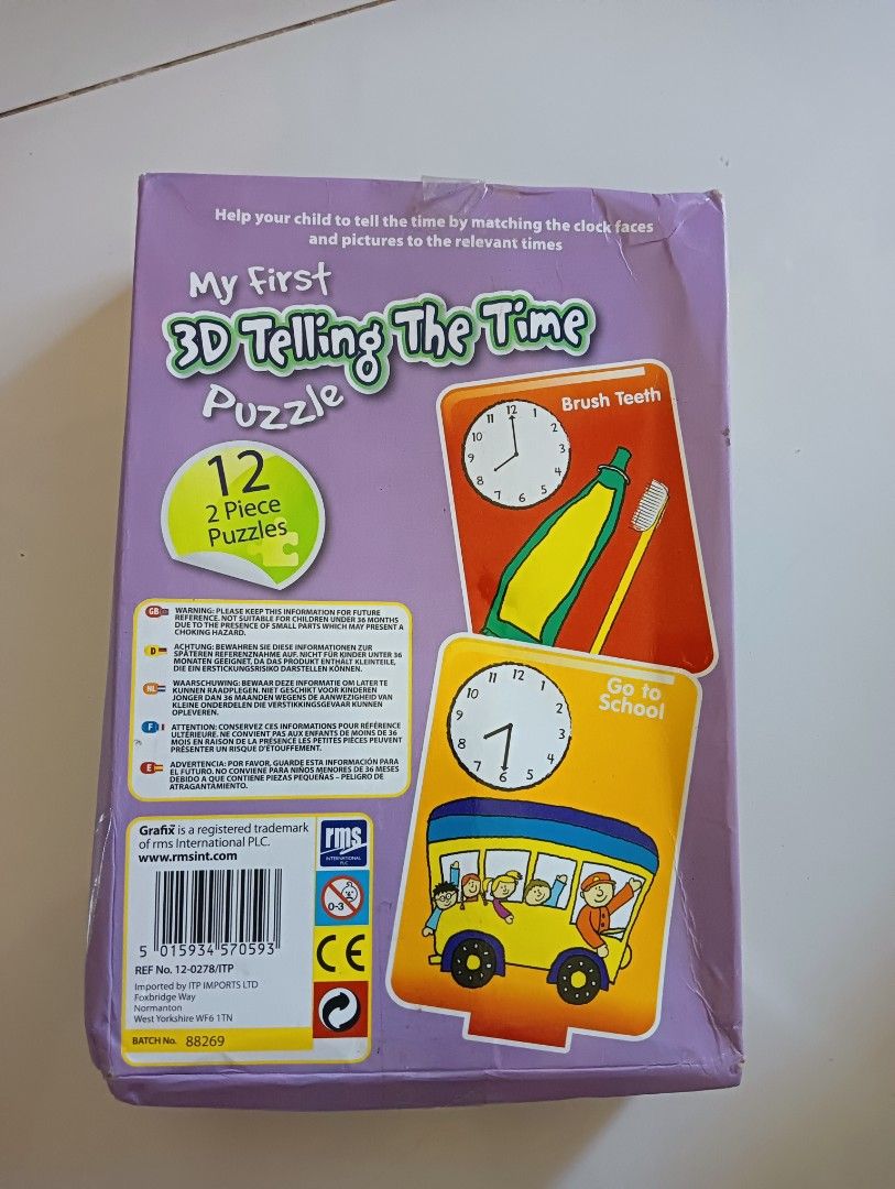 My First 3D Telling The Time Puzzle (Category: Educational & Learning Toys) located in Porac. Submitted by redapple24 (Listing ID 1419408338, Image 2). Description: - 12 two-piece puzzles - Helps kids learn to tell time - Matches clock faces to times - Features illustrations of daily routines (brushing teeth, going to school) - Educational and engaging.