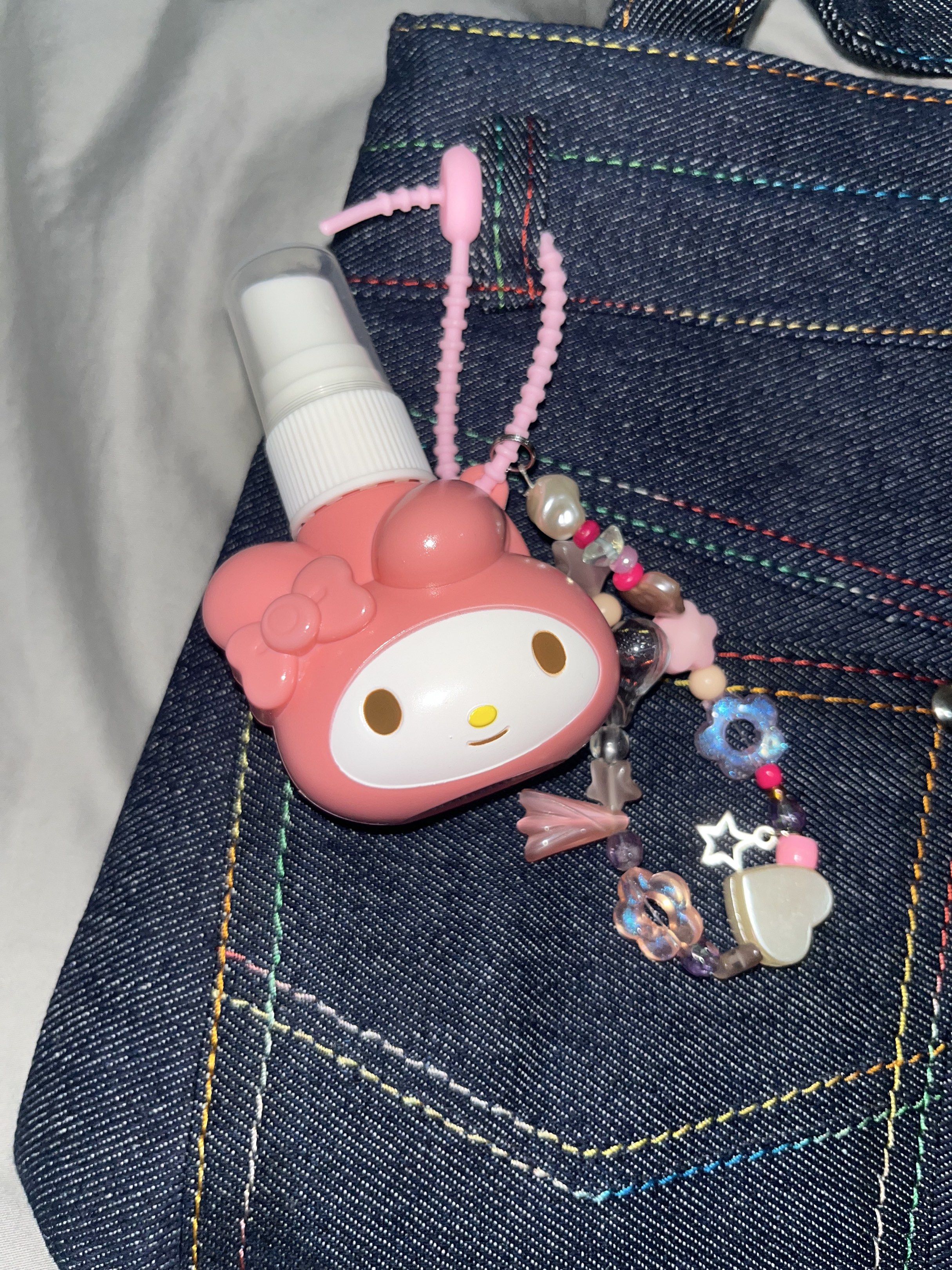 My Melody Spray Bottle with Charm (Category: Character Goods) located in Makati City. Submitted by hellogaragekitty (Listing ID 1419573589, Image 3). Description: MY MELODY ALCOHOL LIQUID CONTAINER CHARM mine 199 lock 219 Reminders! ~ this item is handmade with mix of new and recycled products (specifically beads and trinkets) please set expectations accordingly 🧚🏼‍♀️ ~ color and material might differ on actual due to lighting and etc., rest as
