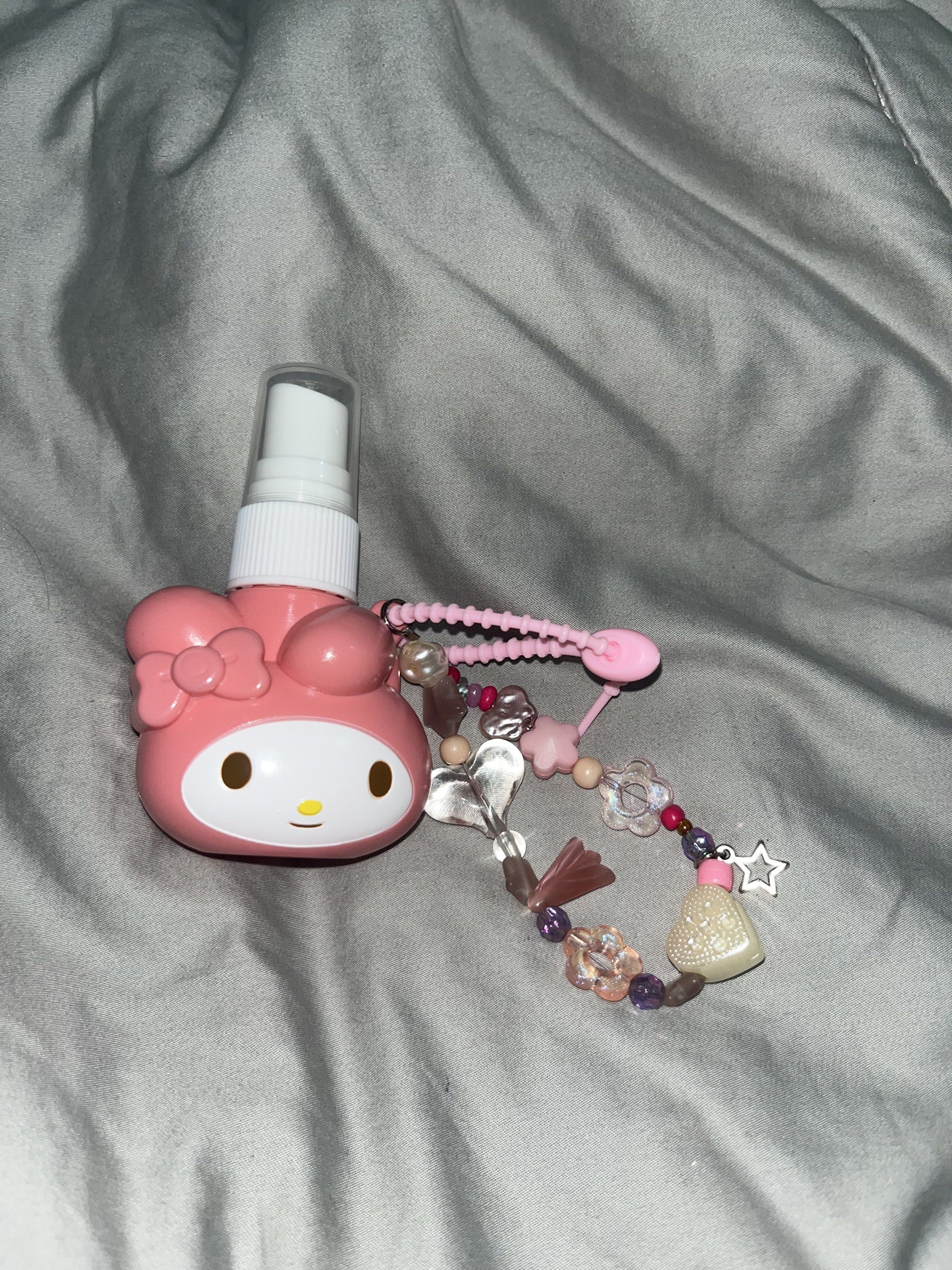 My Melody Spray Bottle with Charm (Category: Character Goods) located in Makati City. Submitted by hellogaragekitty (Listing ID 1419573589, Image 2). Description: MY MELODY ALCOHOL LIQUID CONTAINER CHARM mine 199 lock 219 Reminders! ~ this item is handmade with mix of new and recycled products (specifically beads and trinkets) please set expectations accordingly 🧚🏼‍♀️ ~ color and material might differ on actual due to lighting and etc., rest as