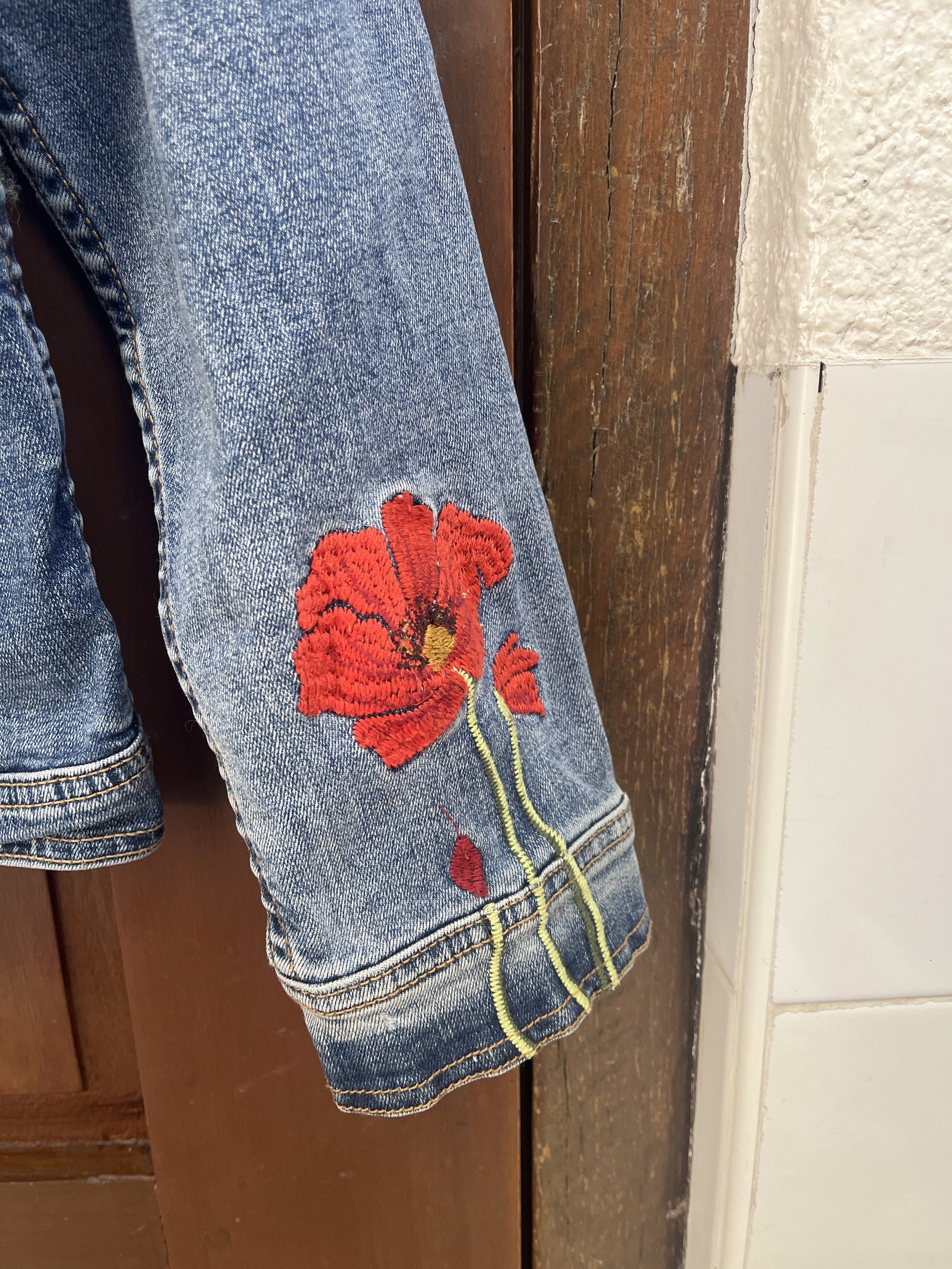Nanette Lepore Embroidered Denim Jacket (Category: Coats, Jackets and Outerwear) located in Muntinlupa City. Submitted by timttam (Listing ID 1419480174, Image 3). Description: - Nanette Lepore denim jacket - Stunning red poppy embroidery on front, back, and sleeves - Light blue wash - Classic button-up design - buttons may be slightly worn out - Two chest pockets - Relaxed fit.