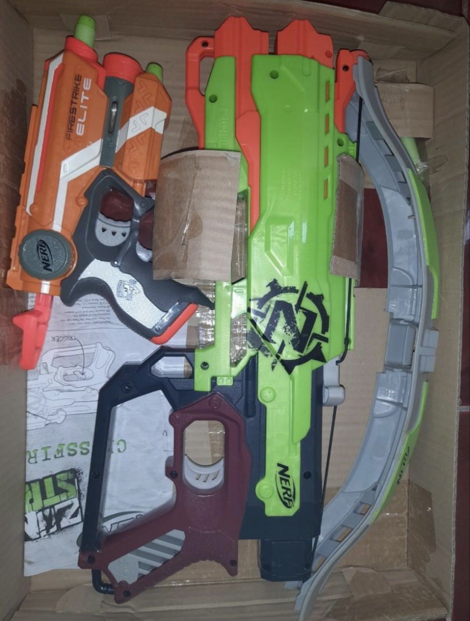 Nerf Zombie Strike Crossfire Bow & Firestrike Elite (Category: Action & Battle Toys) located in Baybay. Submitted by cleverwind.53fdef (Listing ID 1419528315, Image 3). Description: - Nerf Zombie Strike Crossfire Bow included. - Features real crossbow action. - Comes with darts. - Nerf Firestrike Elite blaster included. - Firestrike Elite is orange and white. - Includes original packaging..