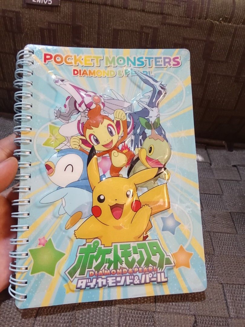 Pokemon Diamond & Pearl Spiral Notebook (Category: Stationery & School Supplies) located in Bocaue. Submitted by marajapansurplus (Listing ID 1419408818, Image 1). Description: - Pokemon Diamond & Pearl themed notebook. - Features a vibrant cover with Pokemon characters. - Lined pages with decorative Pokemon borders. - Ideal for notes, sketches, or journaling. - Compact and easy to carry..