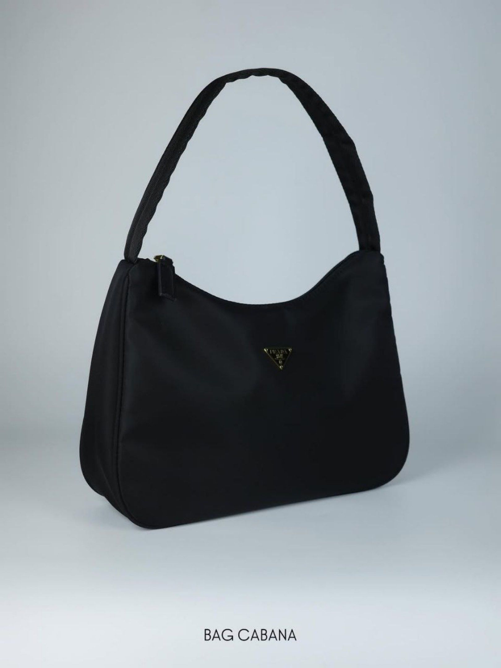 Prada Nylon Hobo Bag (Category: Luxury Bags & Wallets) located in Bulacan. Submitted by gentle.stuffy (Listing ID 1419457367, Image 1). Description: - In excellent condition. - Dm the last price for sure buyer. - Dm for the other infos and photos. - Strictly Payment First. 💸MOP: Bank, Gcash 📦MOD: lalamove, J&T, LBC or buyer preferred choice. The buyer will shoulder the shipping fees..