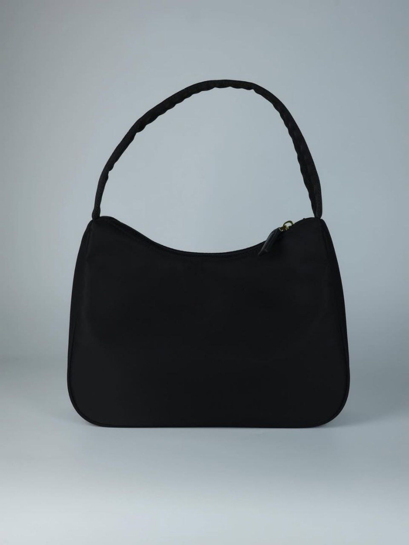 Prada Nylon Hobo Bag (Category: Luxury Bags & Wallets) located in Bulacan. Submitted by gentle.stuffy (Listing ID 1419457367, Image 2). Description: - In excellent condition. - Dm the last price for sure buyer. - Dm for the other infos and photos. - Strictly Payment First. 💸MOP: Bank, Gcash 📦MOD: lalamove, J&T, LBC or buyer preferred choice. The buyer will shoulder the shipping fees..