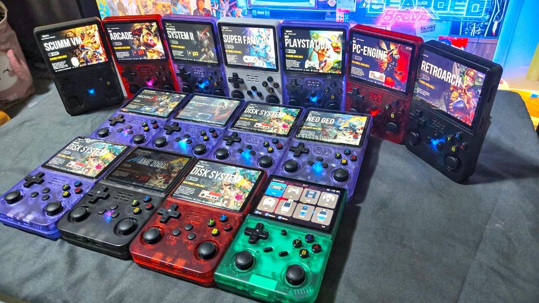R36S Handheld Game Console 64GB (Category: Others) located in Davao. Submitted by leovanniem23152 (Listing ID 1419398433, Image 3). Description: - R36S handheld game console - Available colors: Black, Red, Purple, Green - Designed for retro gaming - Features buttons and directional pad - Screen displays game interfaces.