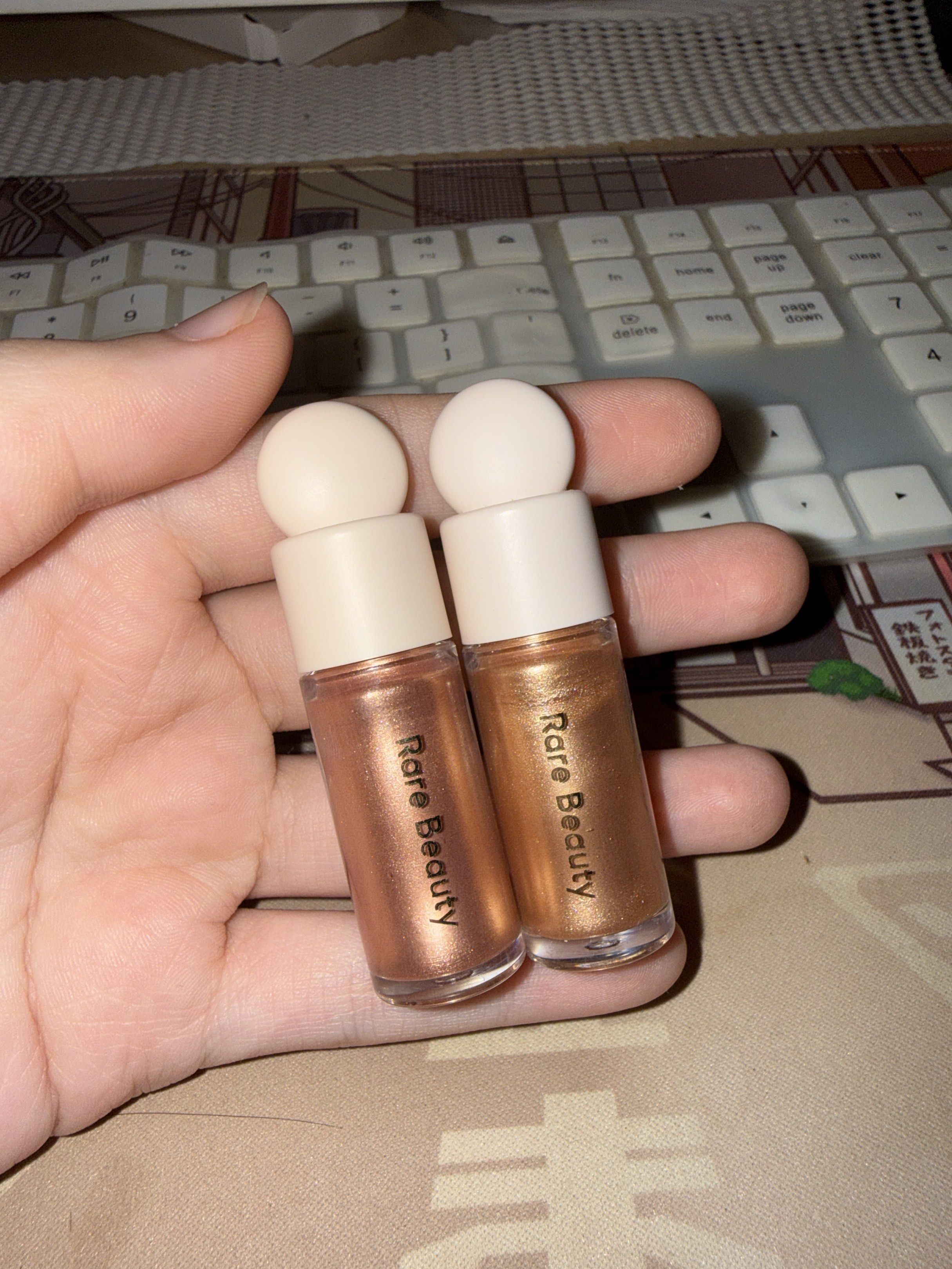Rare Beauty Mini Liquid Luminizer Highlighter in Transcend & Magnetize (Category: Makeup) located in Cabanatuan. Submitted by makeup_goodies (Listing ID 1419515811, Image 1). Description: - Rare Beauty Liquid Luminizers - Shades: Transcend & Magnetize - Size: 2.5 mL per bottle - Made in Italy Swatched only. ₱1100 EACH Or both for ₱1900 RFS: already owning Mesmerize which suits me better.