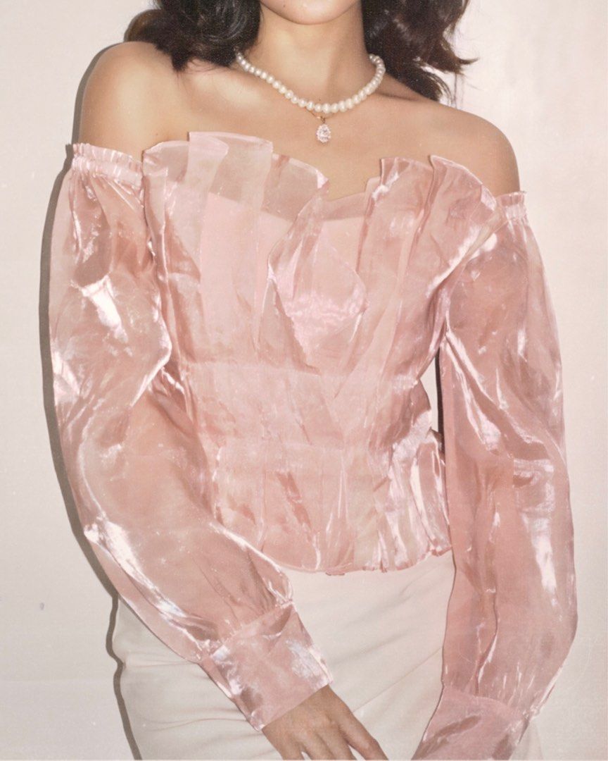 sheer organza fabric off-shoulder top (Category: Others Tops) located in Quezon City. Submitted by buyfromrubyjane (Listing ID 1416094734, Image 2). Description: worn ONCE only! selling the item since im not into off-shoulder tops – can provide actual pictures fit & sizing: 🎀 true to size (model is size small–semi medium) for reference: 32” bust, 26” waistline 🎀 fitted through the bodice 🎀 comfortable stretch at the neckline details: 🎀 off-sh