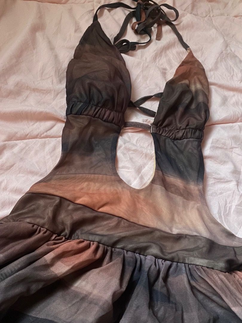 Shein Halter Dress XS (Category: Dresses) located in Iloilo. Submitted by geybrieeeel (Listing ID 1419493369, Image 2). Description: - Shein dress - Size: XS - Halter neckline - Brown and beige color scheme - Tiered skirt - Front cutout design - Sheer material 📌 Exclusively used for a photoshoot, making it almost as good as new..