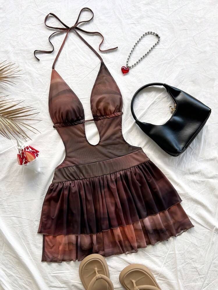 Shein Halter Dress XS (Category: Dresses) located in Iloilo. Submitted by geybrieeeel (Listing ID 1419493369, Image 1). Description: - Shein dress - Size: XS - Halter neckline - Brown and beige color scheme - Tiered skirt - Front cutout design - Sheer material 📌 Exclusively used for a photoshoot, making it almost as good as new..
