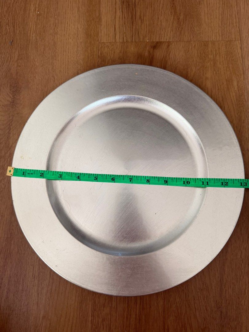 Silver Charger Plates (Category: Dinnerware & Cutlery) located in Pasig City. Submitted by riccimoi (Listing ID 1419456848, Image 3). Description: 400 take all.